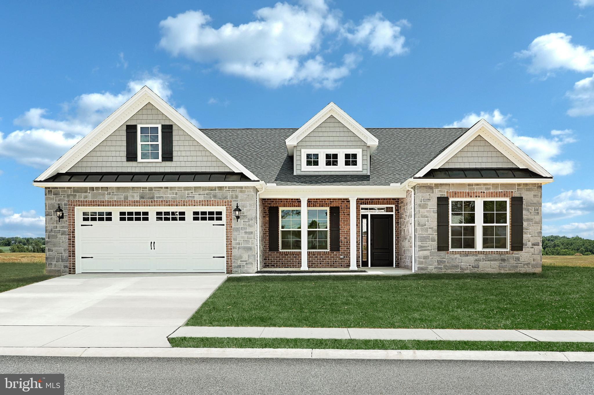 567 Lumber Street Littlestown, PA 17340 - Photo 4 of 62 a front view of a house with a yard