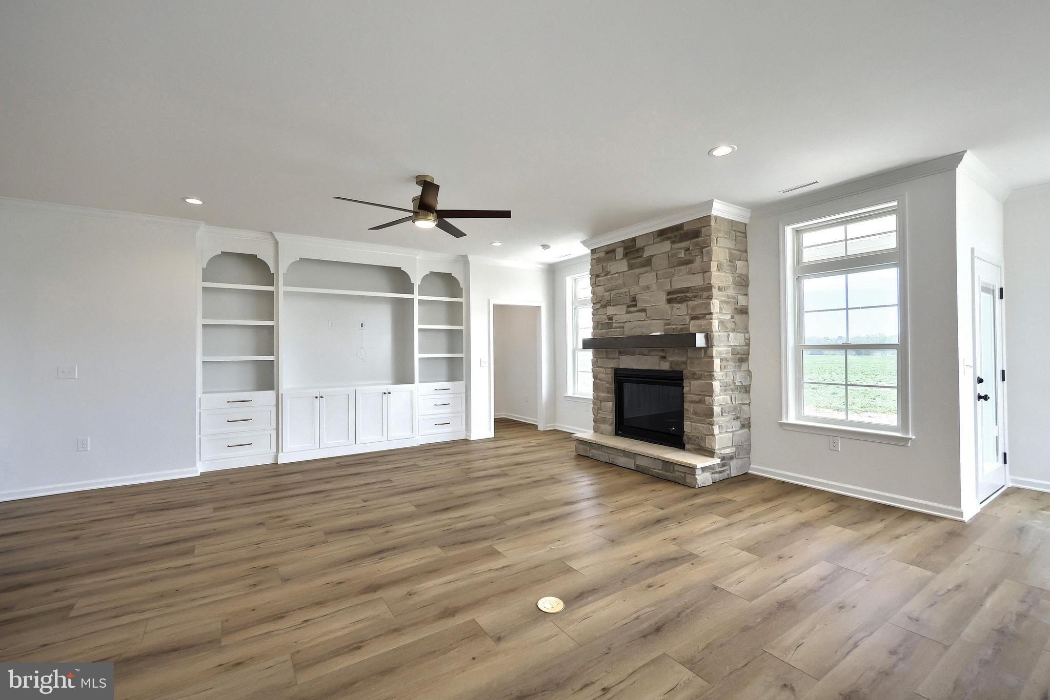 567 Lumber Street Littlestown, PA 17340 - Photo 42 of 62 a view of an empty room with a fireplace and a window