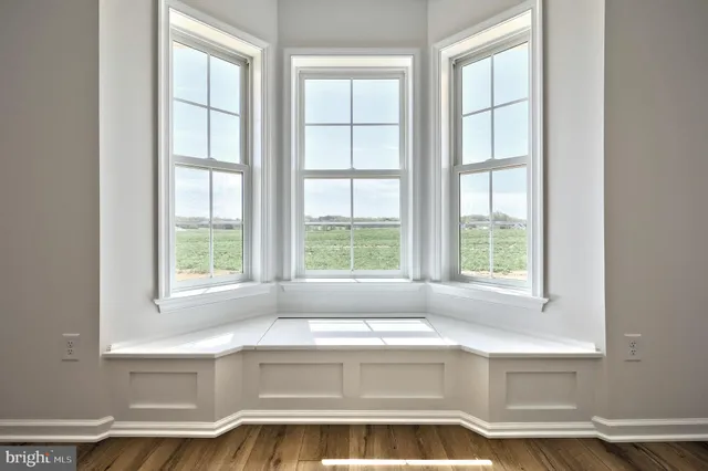 a kitchen with stainless steel appliances granite countertop a refrigerator and a stove
