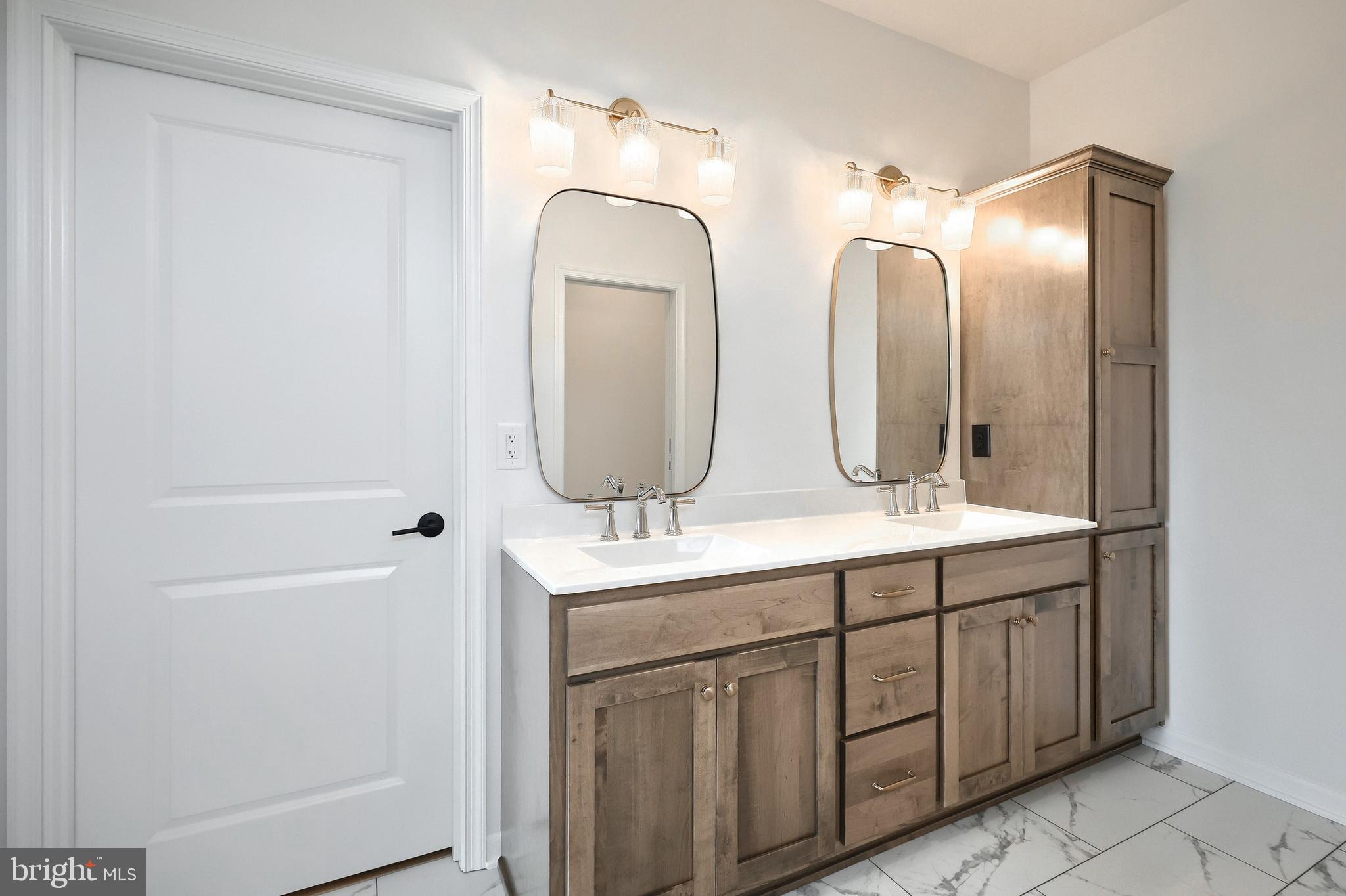 567 Lumber Street Littlestown, PA 17340 - Photo 50 of 62 a bathroom with double vanity sinks and a mirror