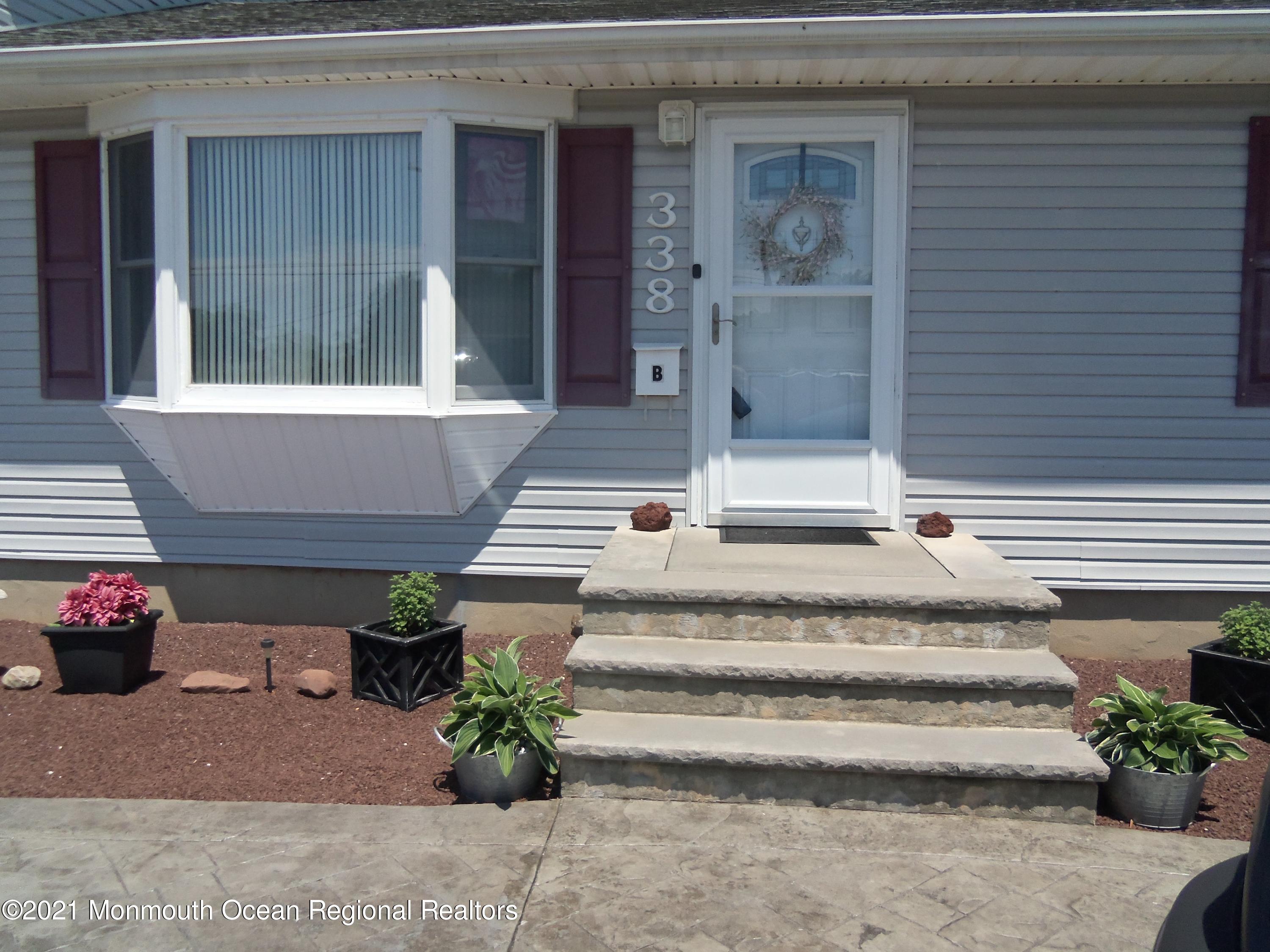 338 Pitcairn Road Brick, NJ 08723 - Photo 17 of 24 a view of a entryway door front of house
