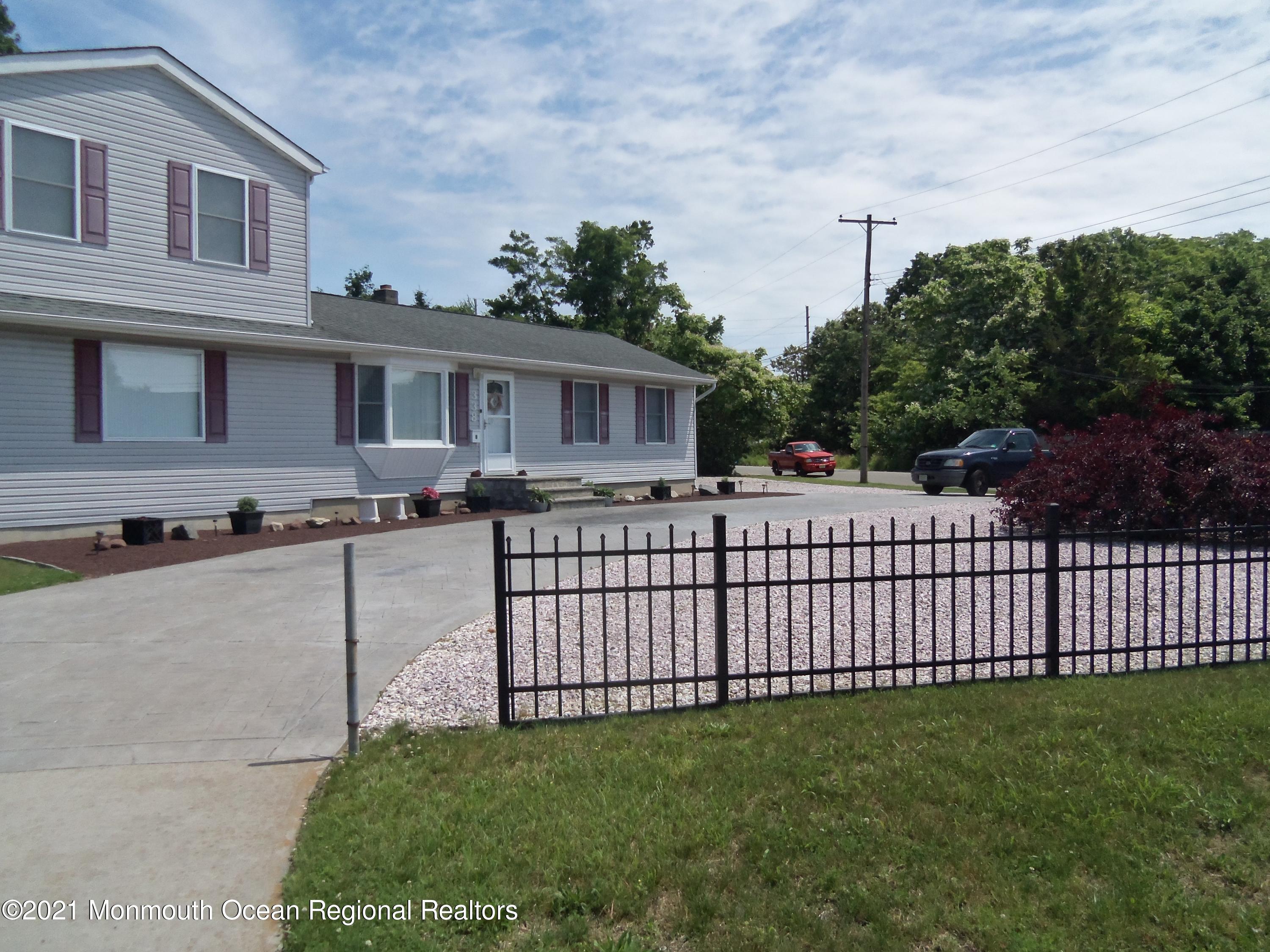 338 Pitcairn Road Brick, NJ 08723 - Photo 19 of 24 a view of a house with a backyard