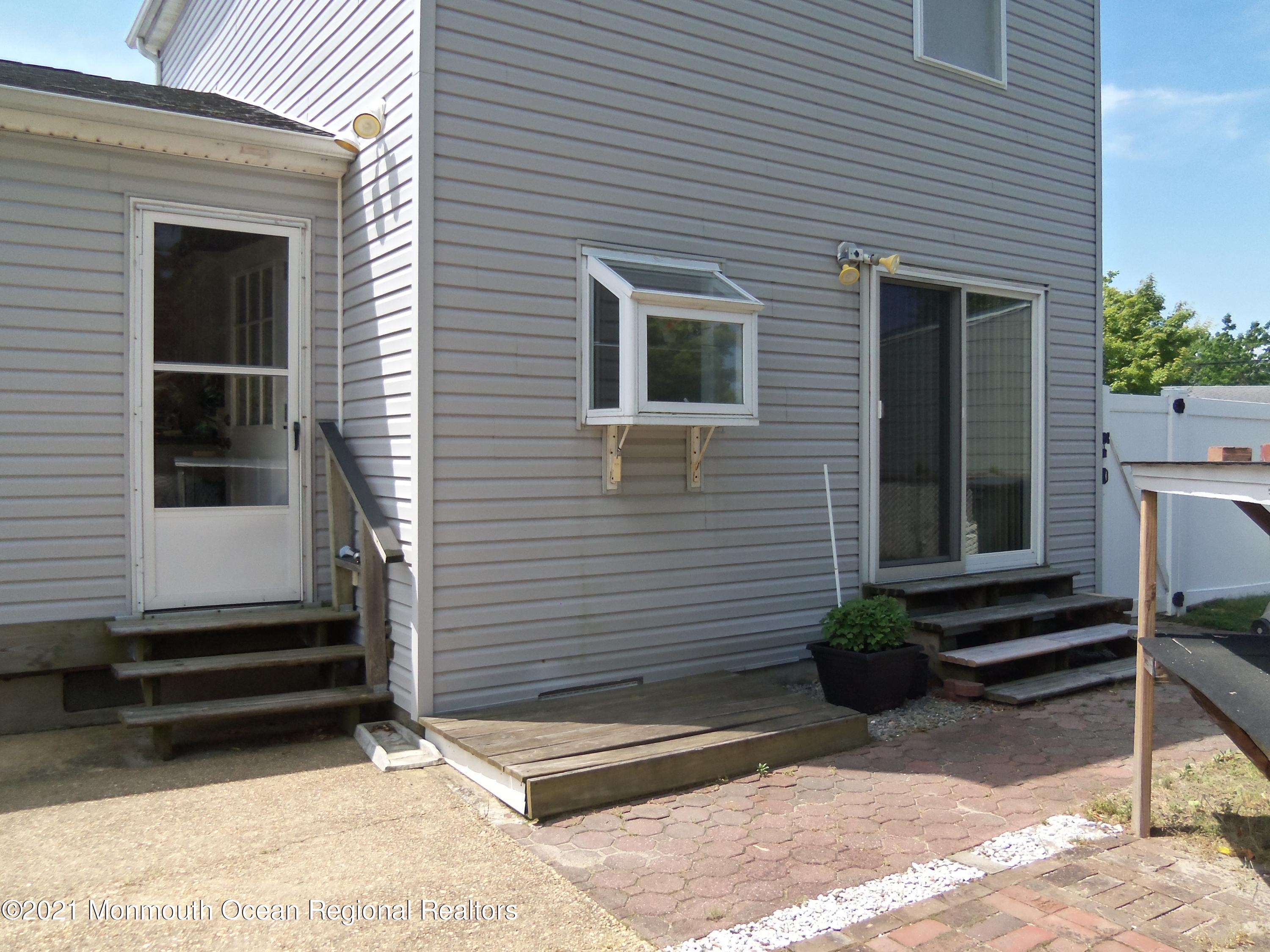 338 Pitcairn Road Brick, NJ 08723 - Photo 22 of 24 a view of house with chair in front of house