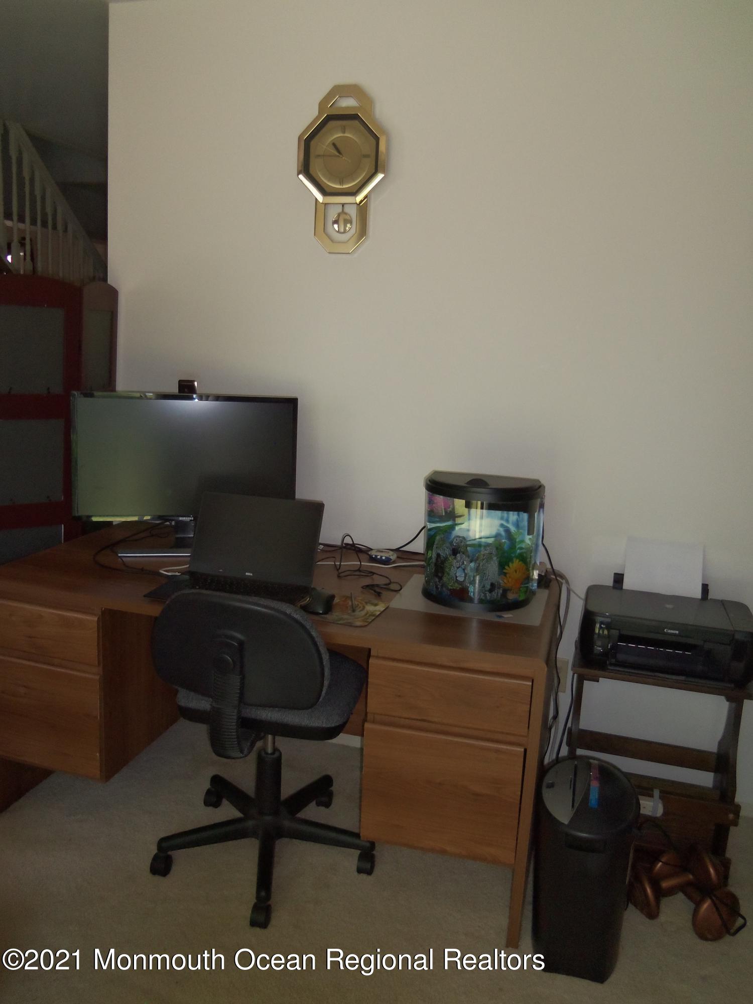 338 Pitcairn Road Brick, NJ 08723 - Photo 5 of 24 a workspace with furniture and musical instruments