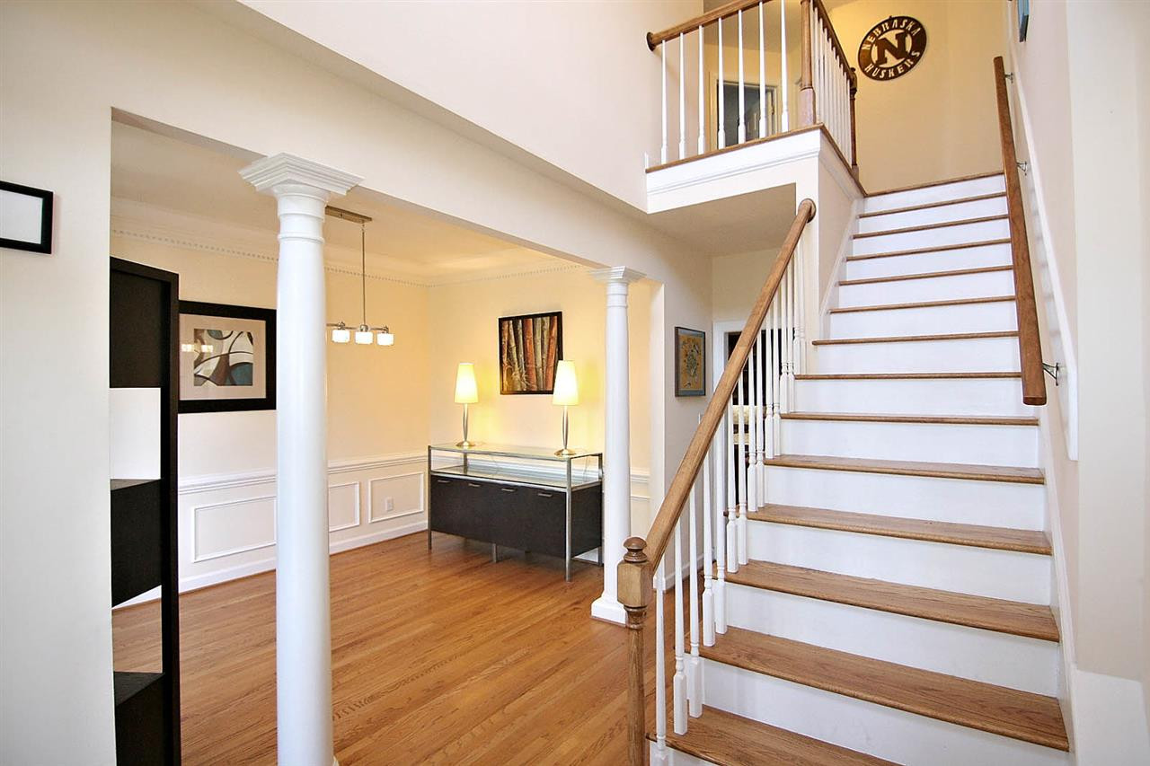 7608 Percy Court Raleigh, NC 27613 - Photo 7 of 25 You will Love Welcoming your Best Friends into the Inviting Two-story Foyer complete with Hardwood Floors 2- Story Foyer
