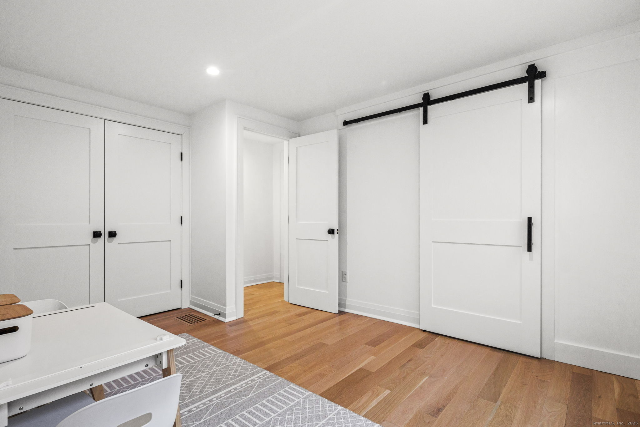 22 Harstrom Place Norwalk, CT 06853 - Photo 13 of 26 a room that has a bed and a closet in it