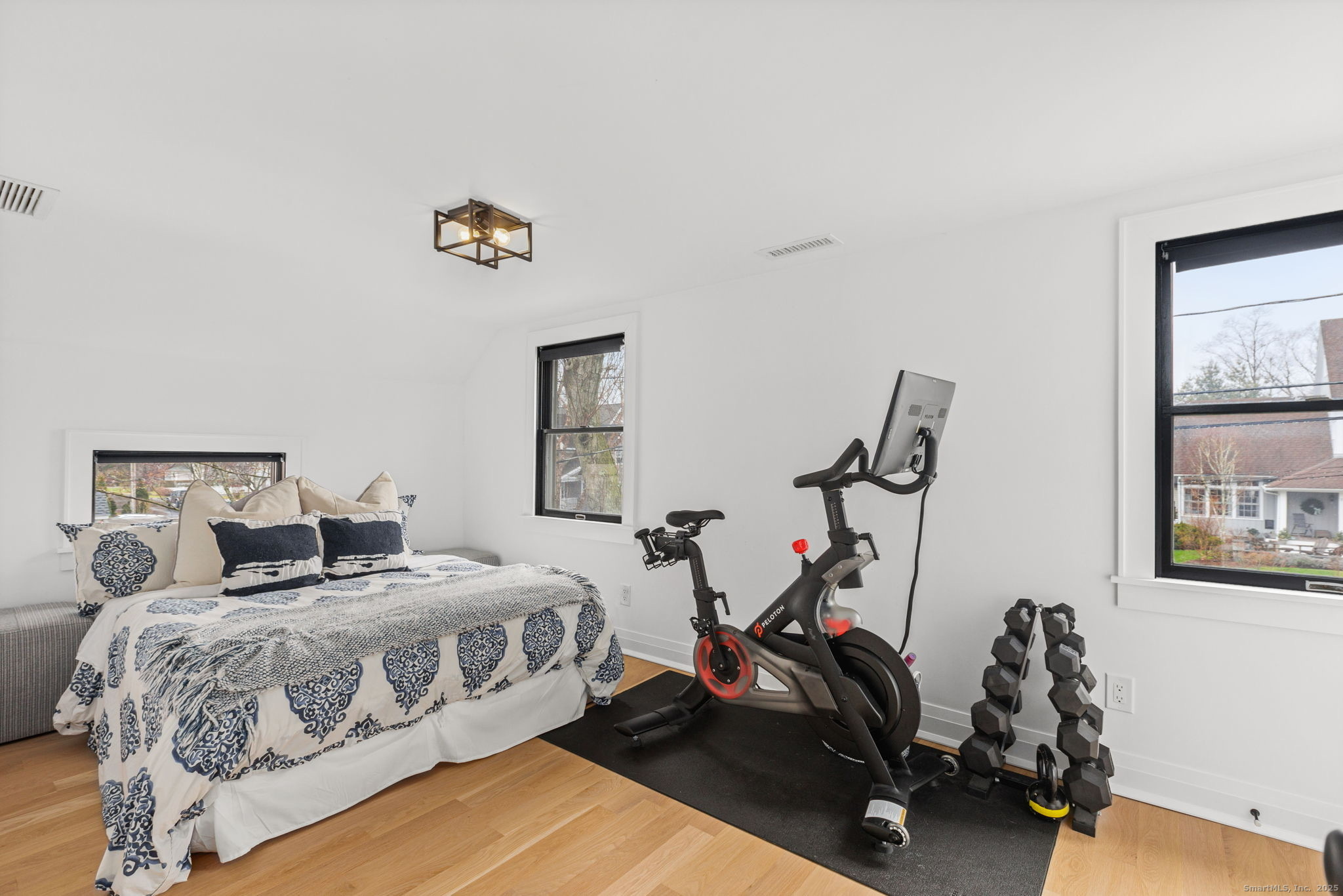 22 Harstrom Place Norwalk, CT 06853 - Photo 21 of 26 a bedroom with a bed and a window