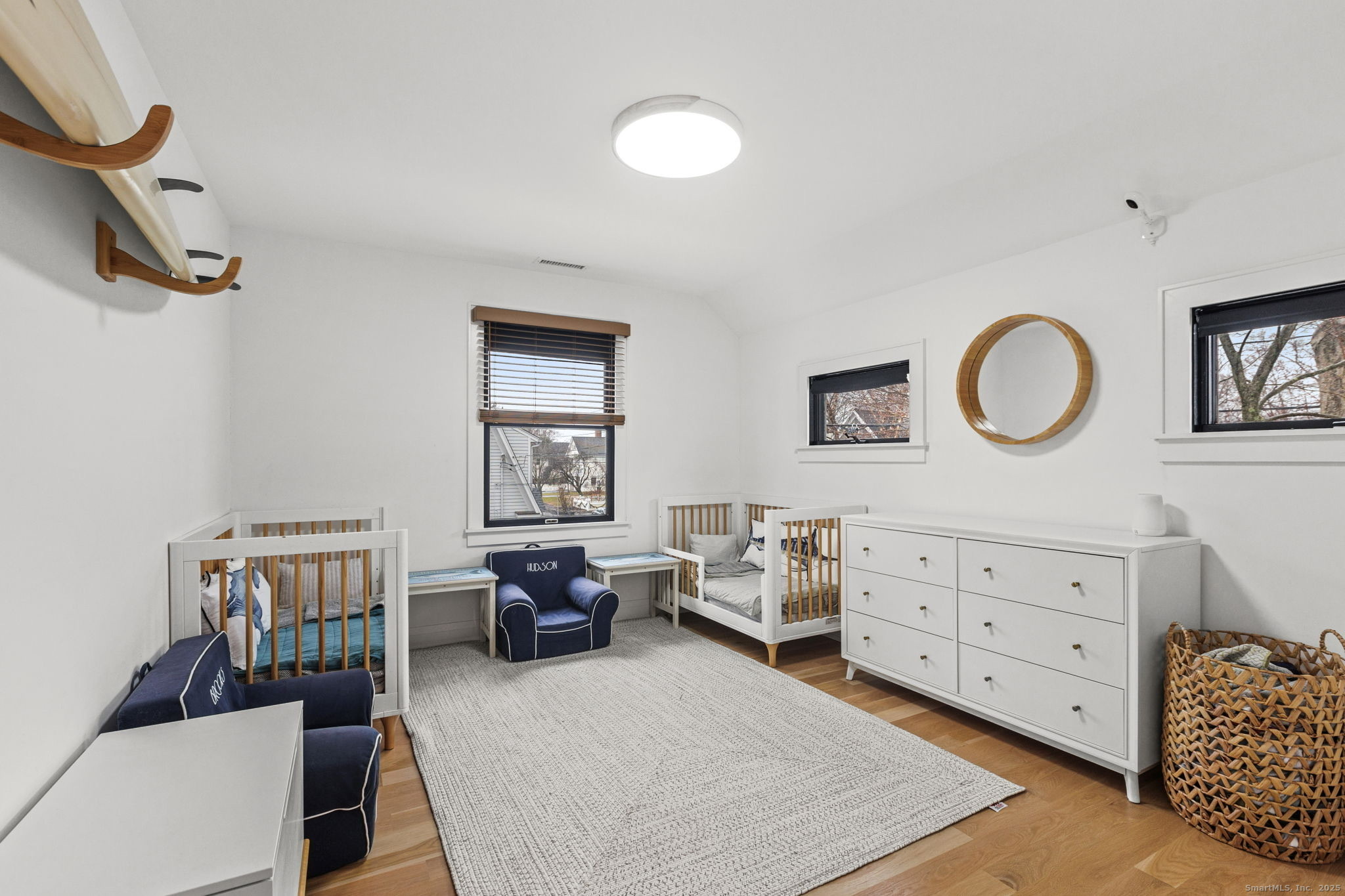 22 Harstrom Place Norwalk, CT 06853 - Photo 23 of 26 a bedroom with a bed and furniture