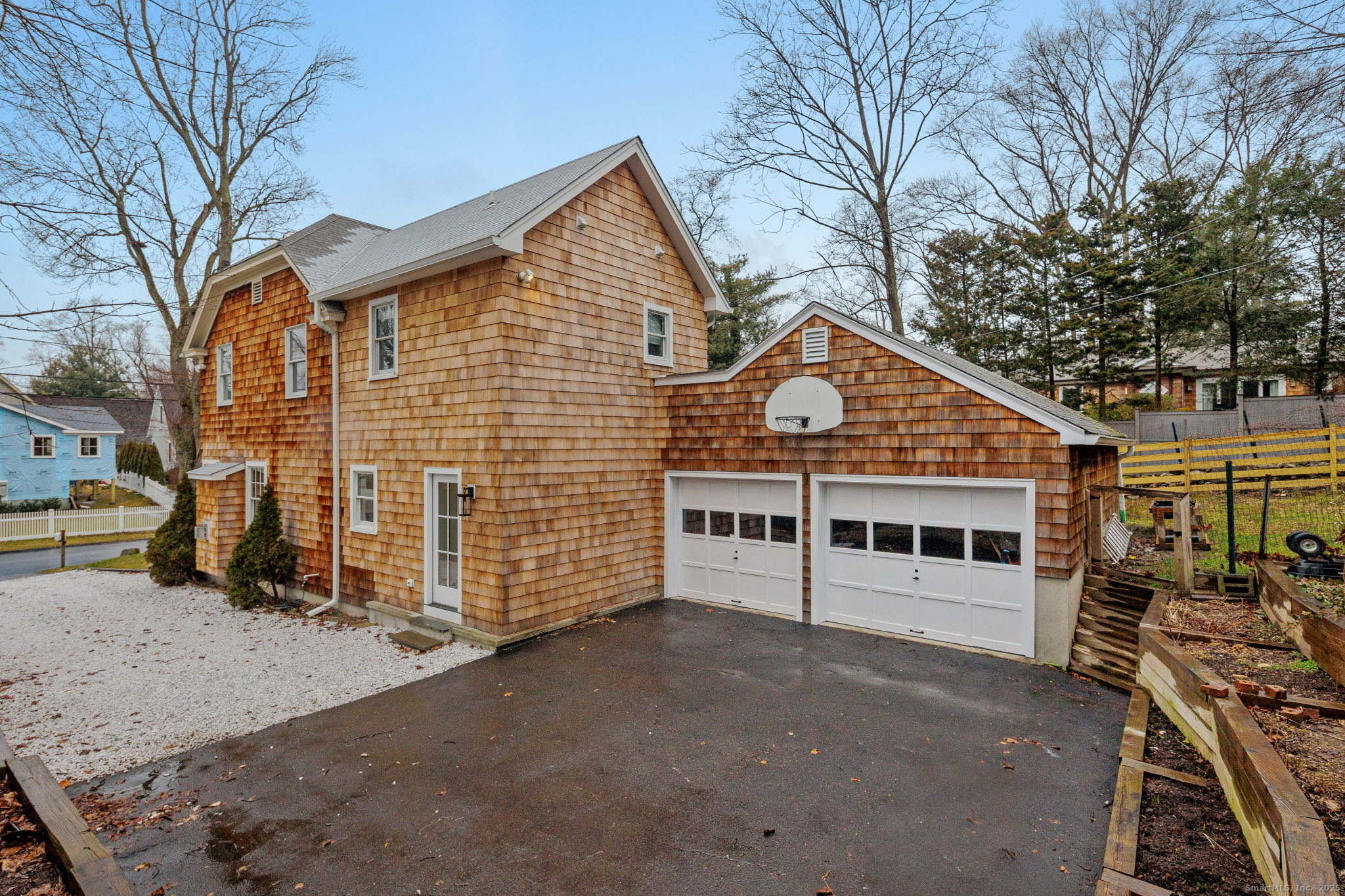 22 Harstrom Place Norwalk, CT 06853 - Photo 25 of 26 a view of a house with a yard