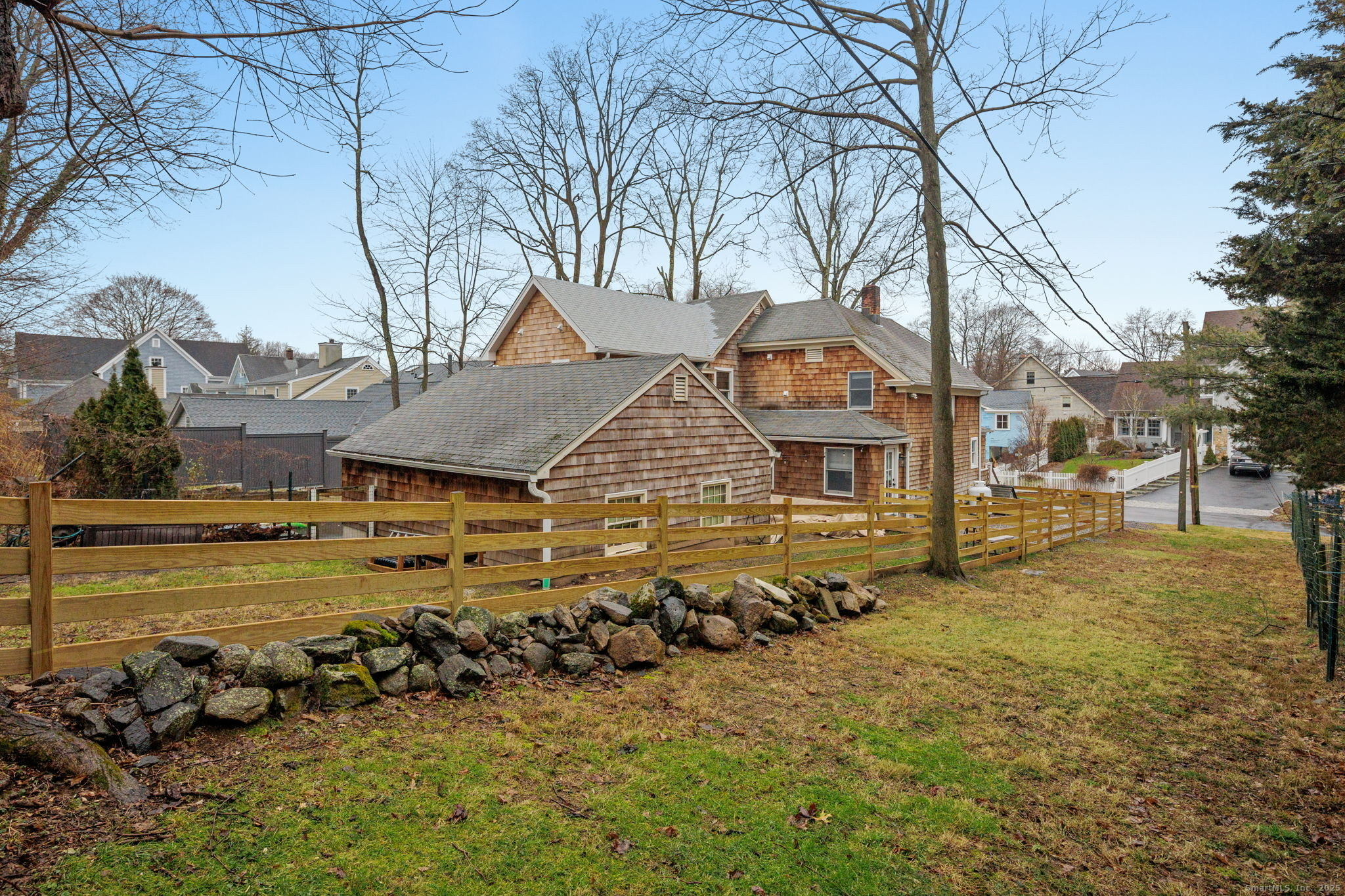 22 Harstrom Place Norwalk, CT 06853 - Photo 26 of 26 a front view of a house with a yard