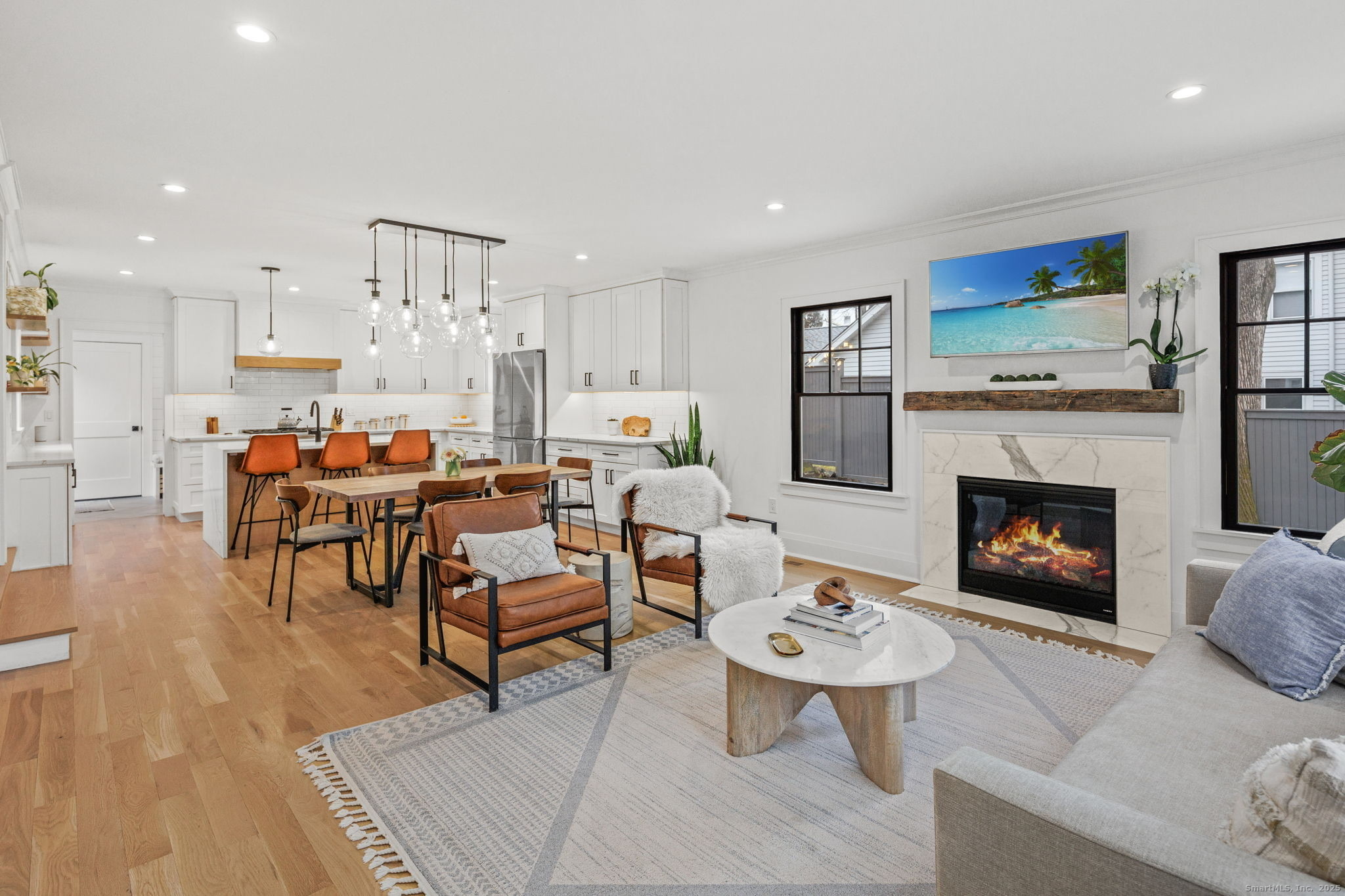 22 Harstrom Place Norwalk, CT 06853 - Photo 7 of 26 a living room with furniture and a fireplace