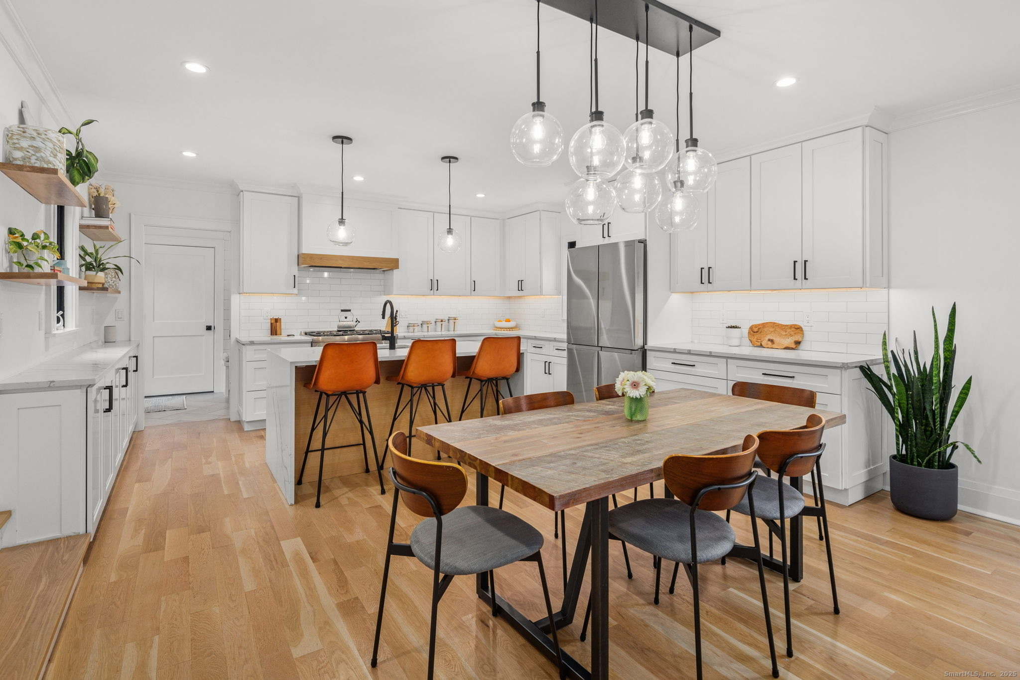 22 Harstrom Place Norwalk, CT 06853 - Photo 9 of 26 a view of a dining room with furniture and wooden floor
