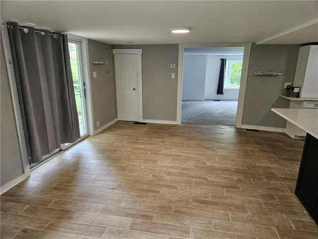 a view of a room and window