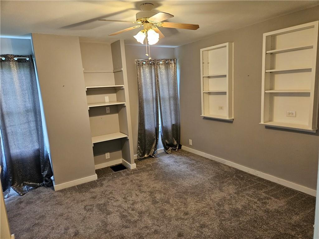 451 Buttermilk Hollow Road Irwin, PA 15642 - Photo 22 of 35 an empty room with closet and windows