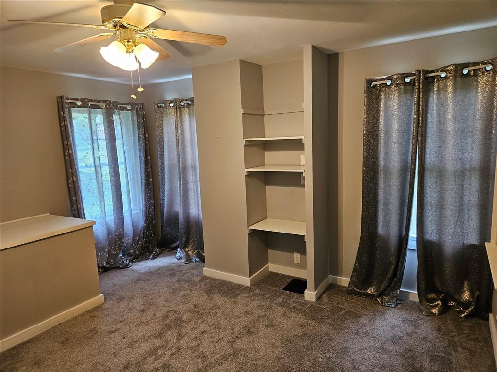 451 Buttermilk Hollow Road Irwin, PA 15642 - Photo 23 of 35 an empty room with closet and windows