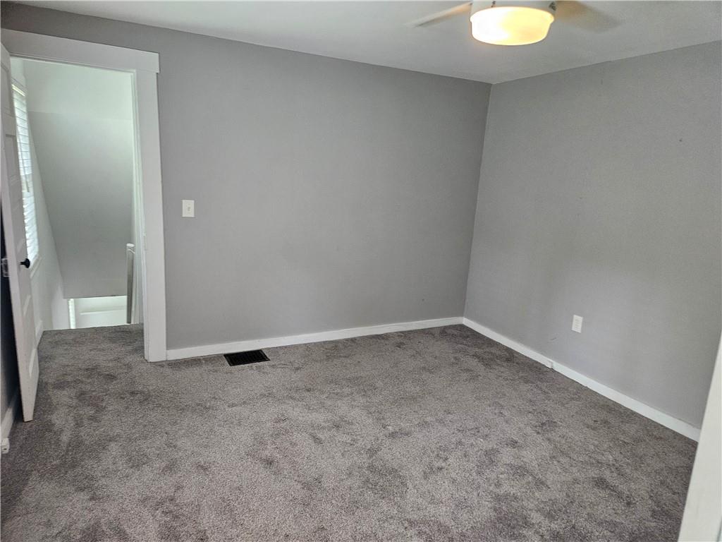 451 Buttermilk Hollow Road Irwin, PA 15642 - Photo 33 of 35 a view of an empty room and window