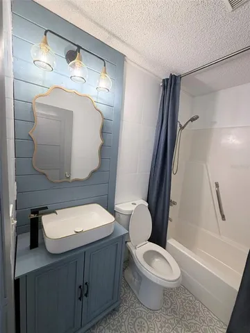 a view of a walk in closet and bedroom