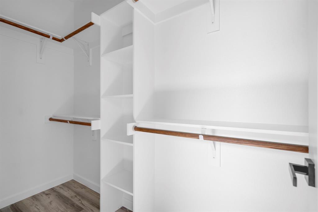 948 Corinth Street, Unit 5 Dallas, TX 75215 - Photo 17 of 28 Walk in closet featuring light wood-style flooring