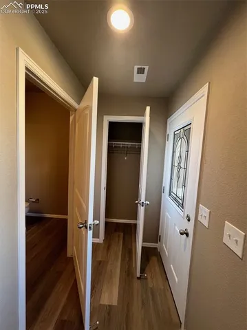 a kitchen with stainless steel appliances granite countertop a sink a stove a counter top space and cabinets