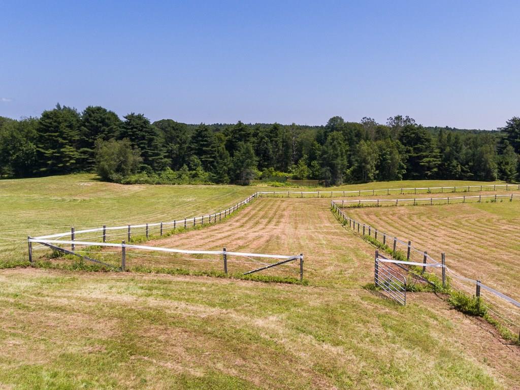 295 Lowell Town Road Wiscasset, ME 04578 - Photo 22 of 25 Fenced pasture