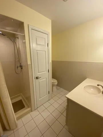 a bathroom with a sink and a shower