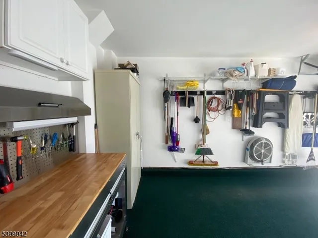 a view of a dining room with lots of furniture