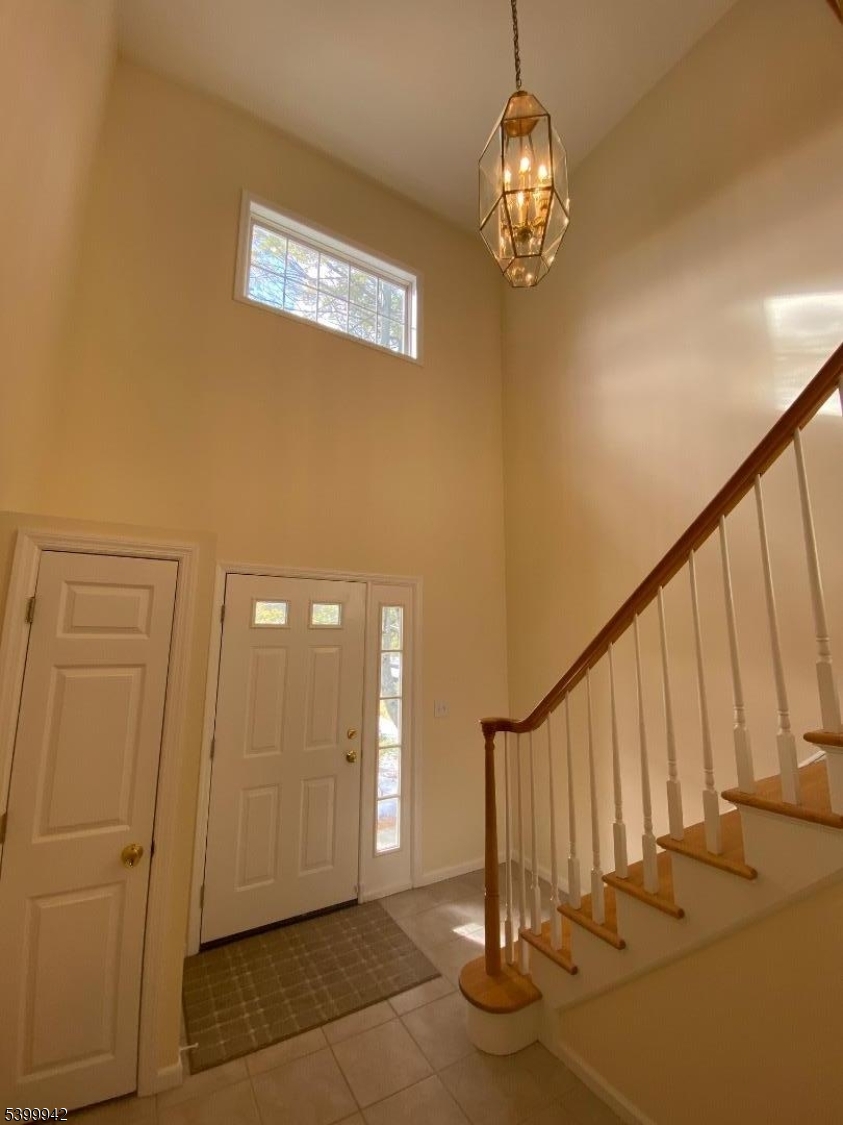 20 Cotton Court Hamburg, NJ 07419 - Photo 20 of 21 a view of a livingroom with stairs