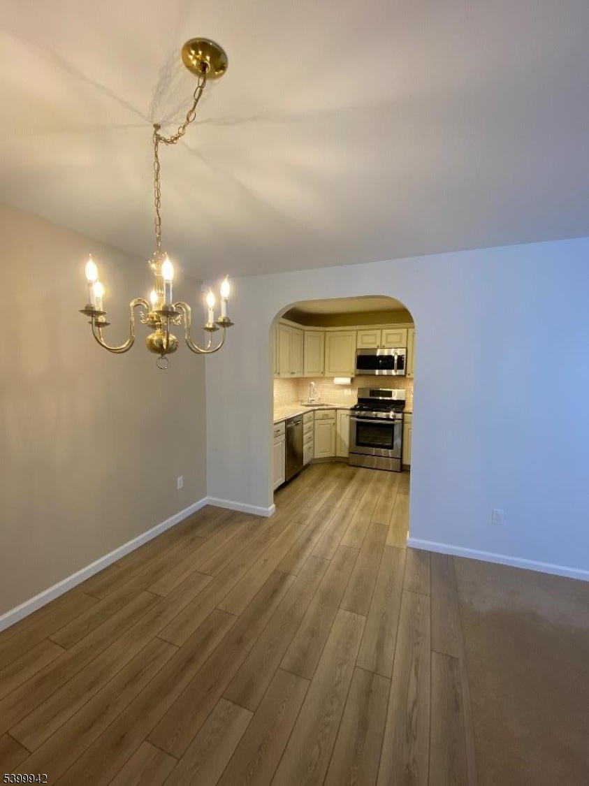 20 Cotton Court Hamburg, NJ 07419 - Photo 8 of 21 a view of a room with wooden floor