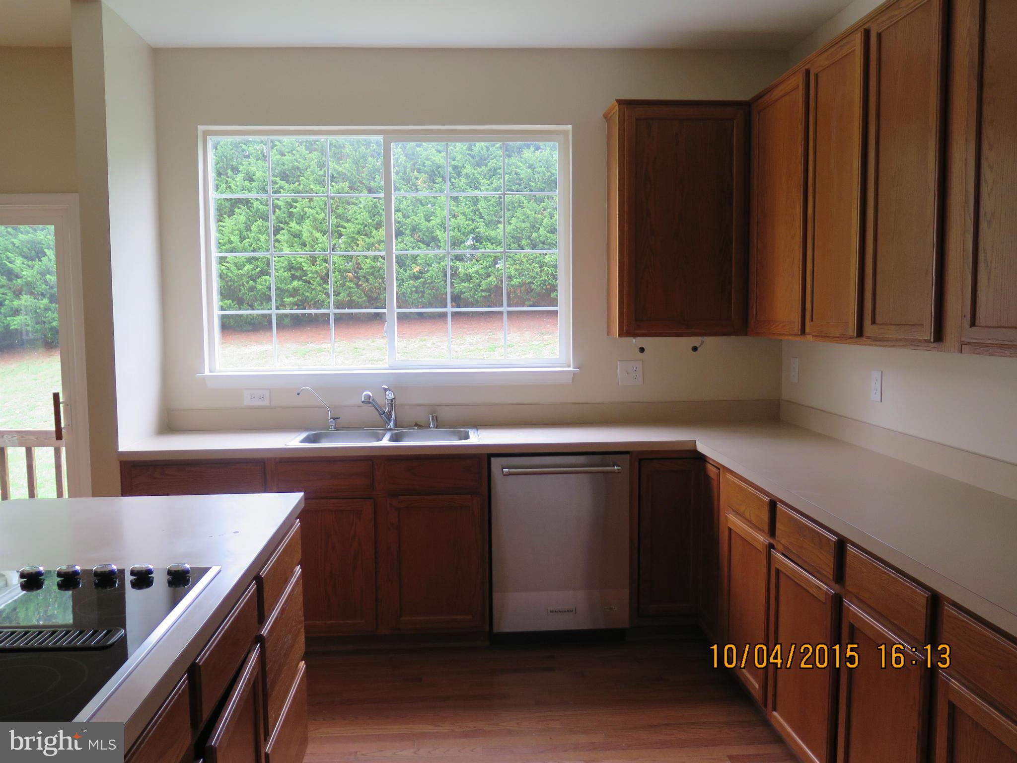 8506 Topaz Court Clinton, MD 20735 - Photo 13 of 30 a kitchen with a sink and a window