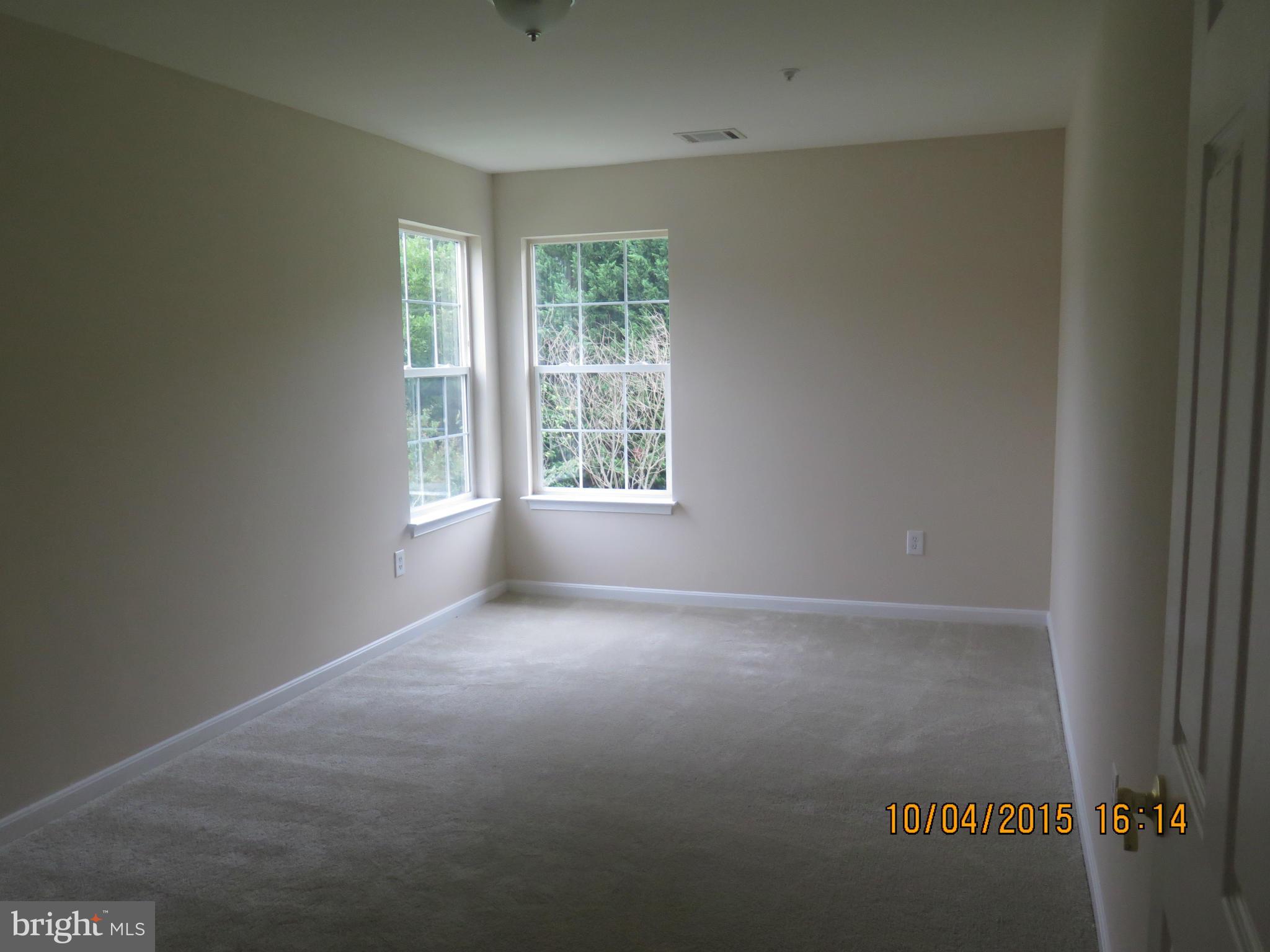 8506 Topaz Court Clinton, MD 20735 - Photo 16 of 30 an empty room with windows
