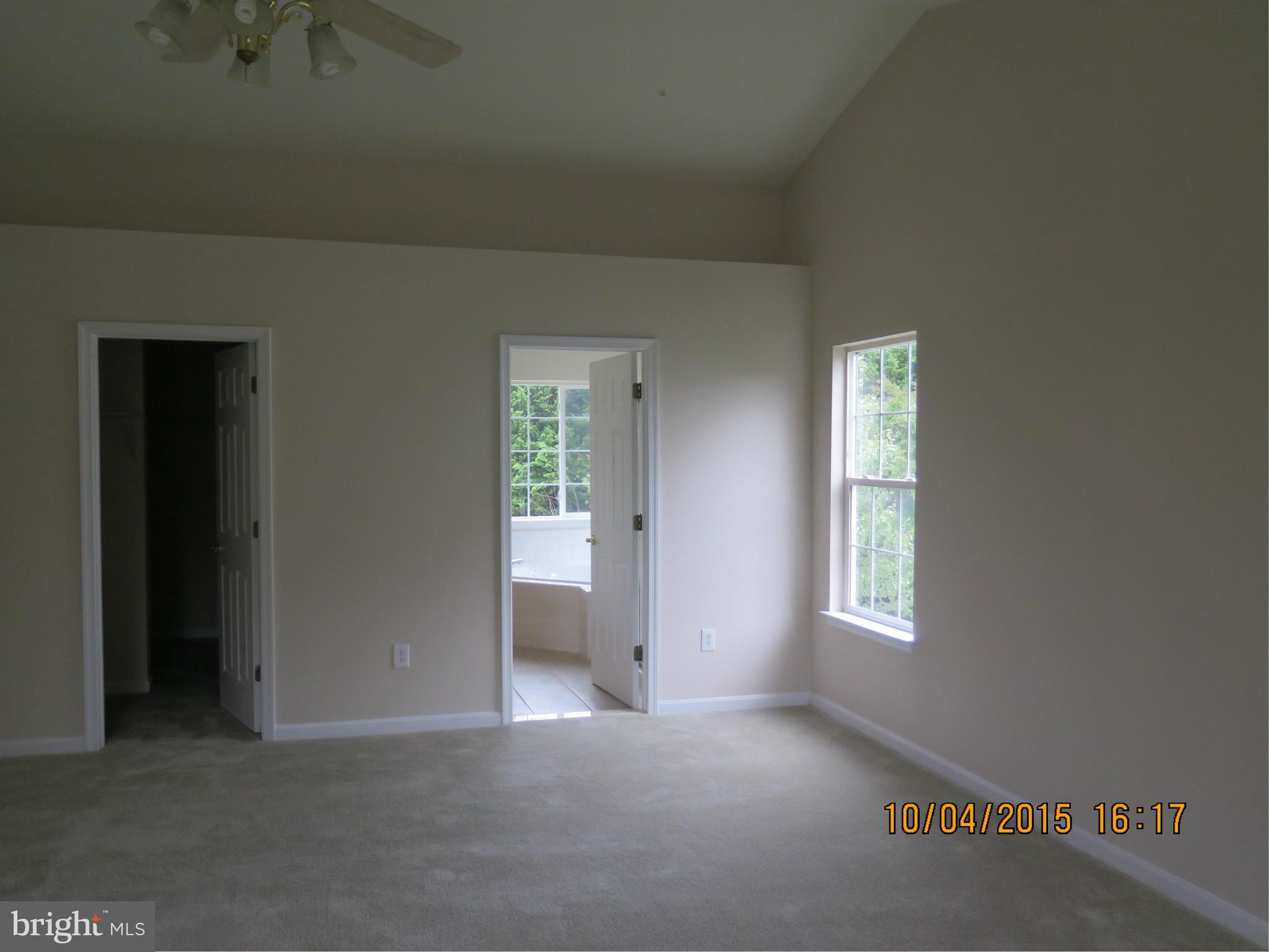 8506 Topaz Court Clinton, MD 20735 - Photo 18 of 30 an empty room with windows