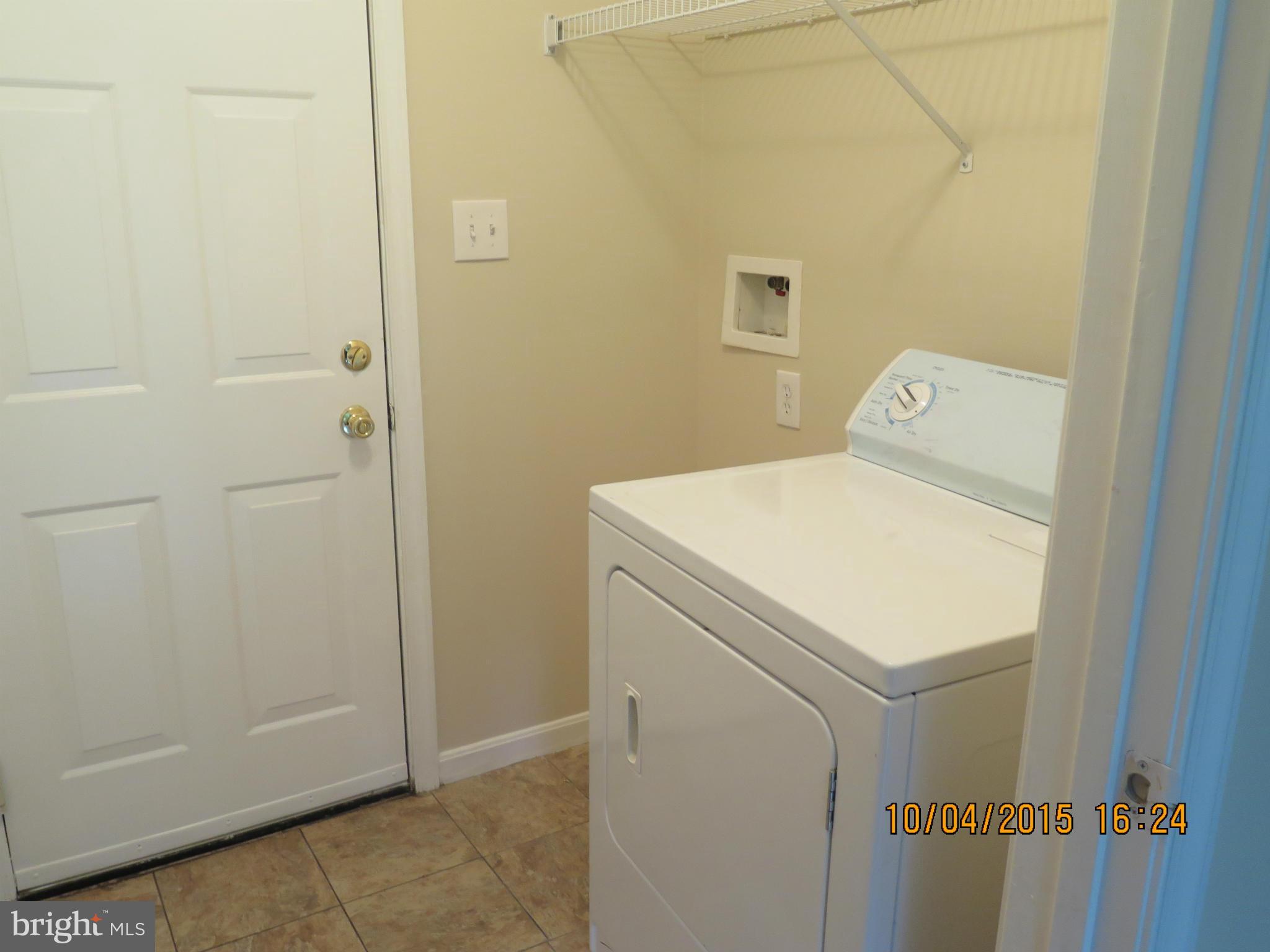 8506 Topaz Court Clinton, MD 20735 - Photo 26 of 30 a utility room with dryer and washer
