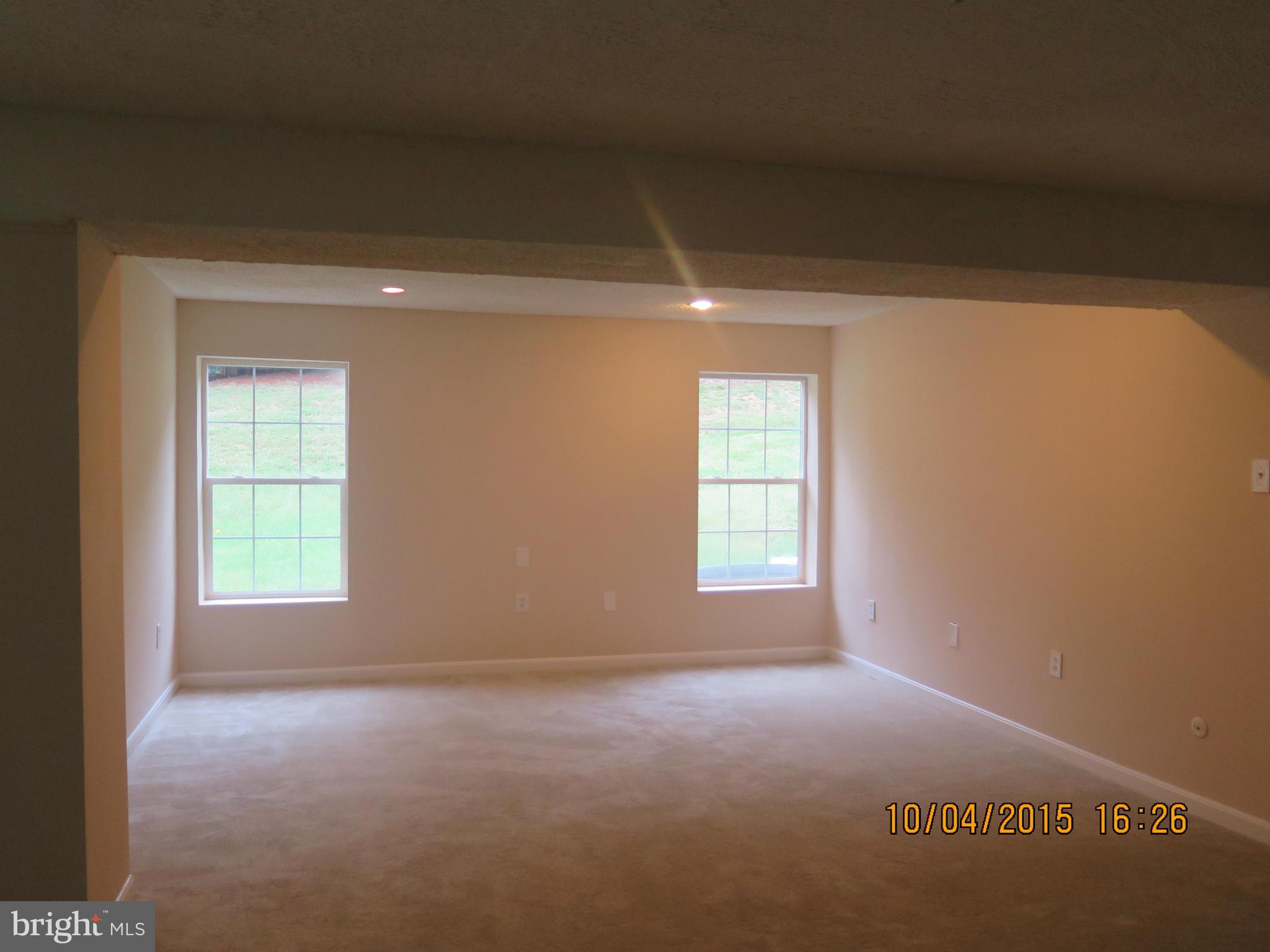 8506 Topaz Court Clinton, MD 20735 - Photo 28 of 30 a view of empty room with windows