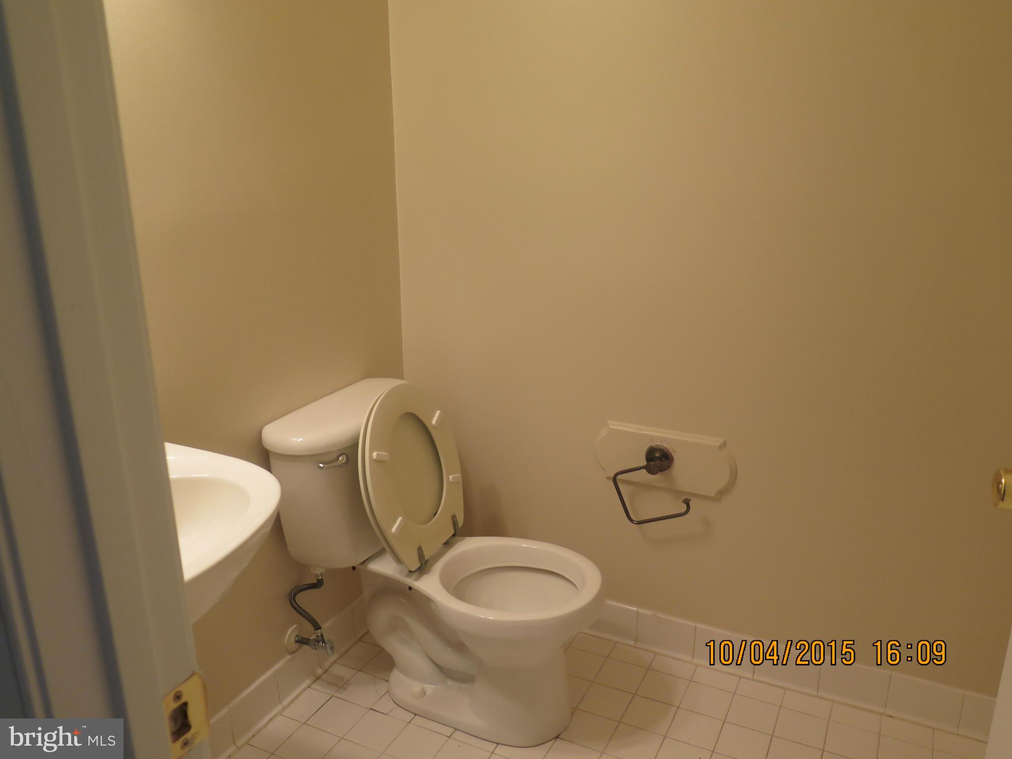 8506 Topaz Court Clinton, MD 20735 - Photo 5 of 30 a white toilet sitting next to a shower