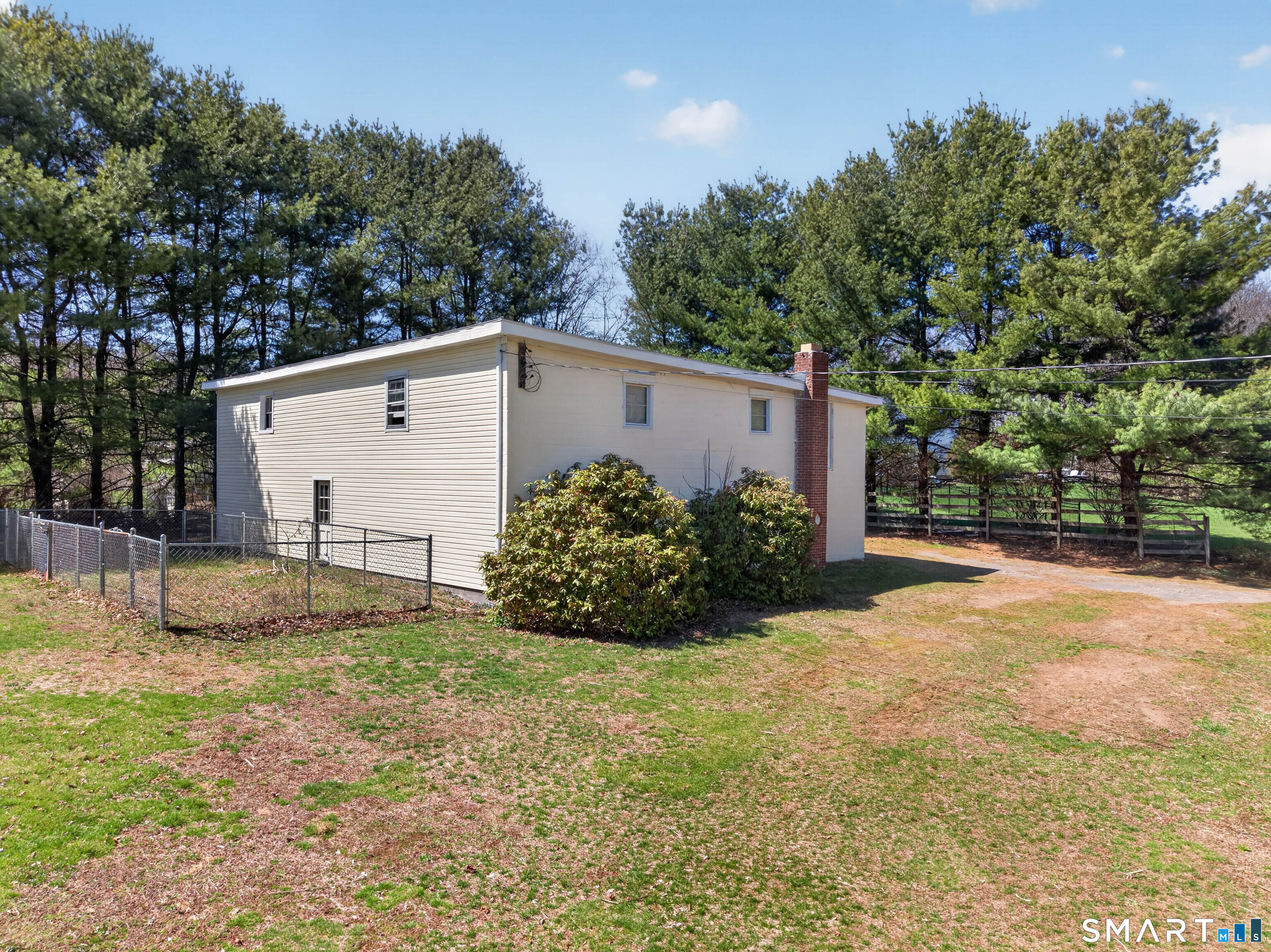 1092 Durham Road Guilford, CT 06437 - Photo 14 of 61 a view of a backyard with plants