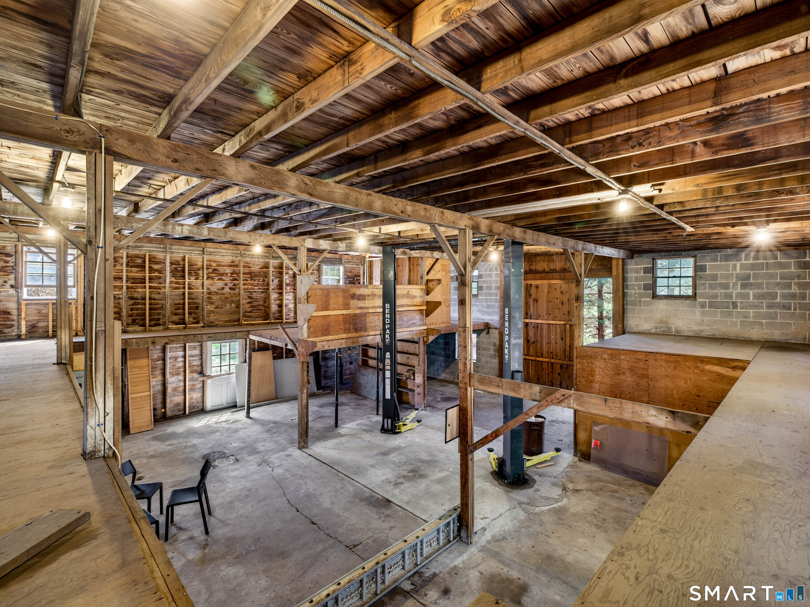 1092 Durham Road Guilford, CT 06437 - Photo 16 of 61 a view of a patio with table and chairs