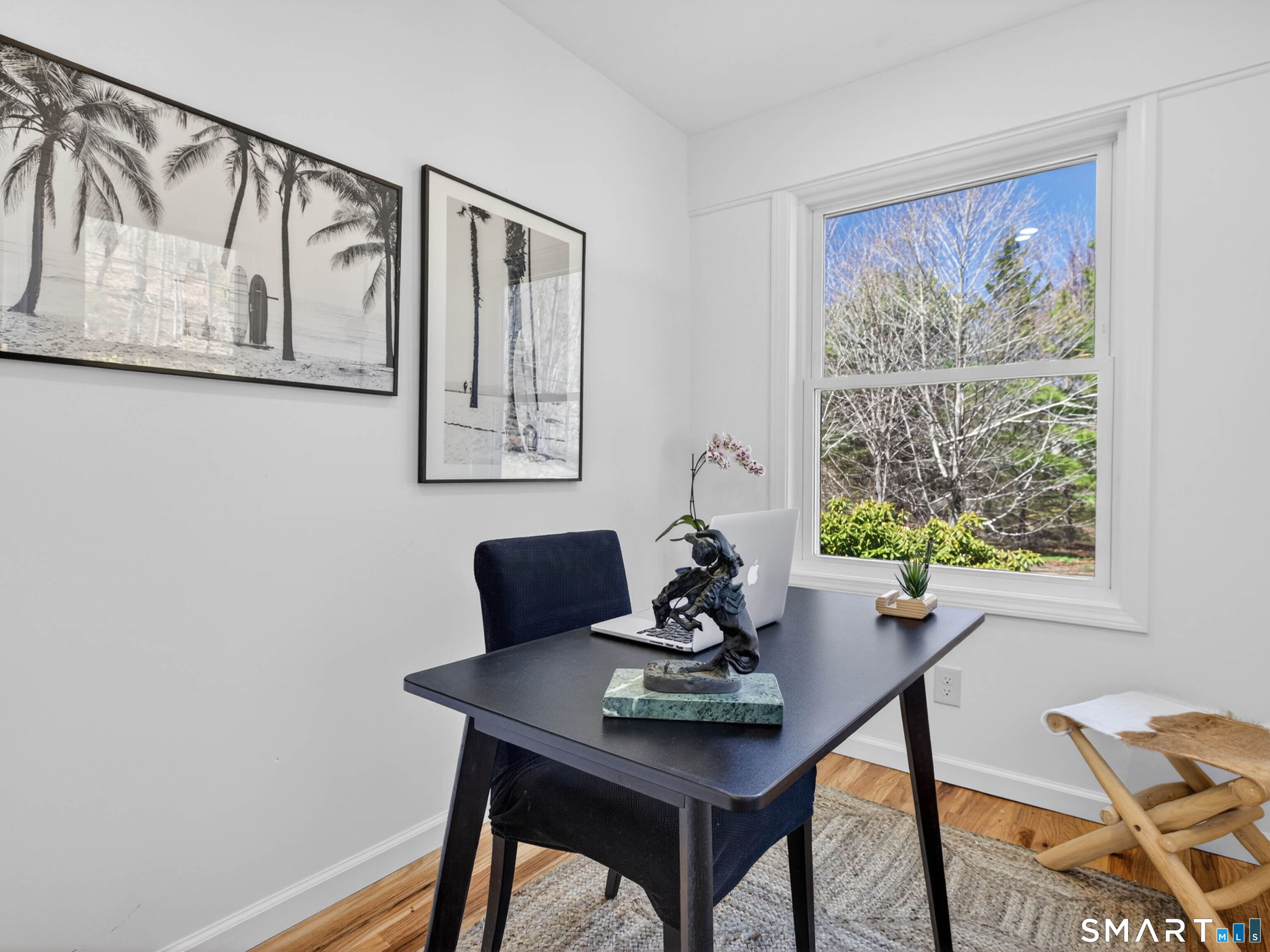 1092 Durham Road Guilford, CT 06437 - Photo 27 of 61 a view of a workspace with furniture and a window