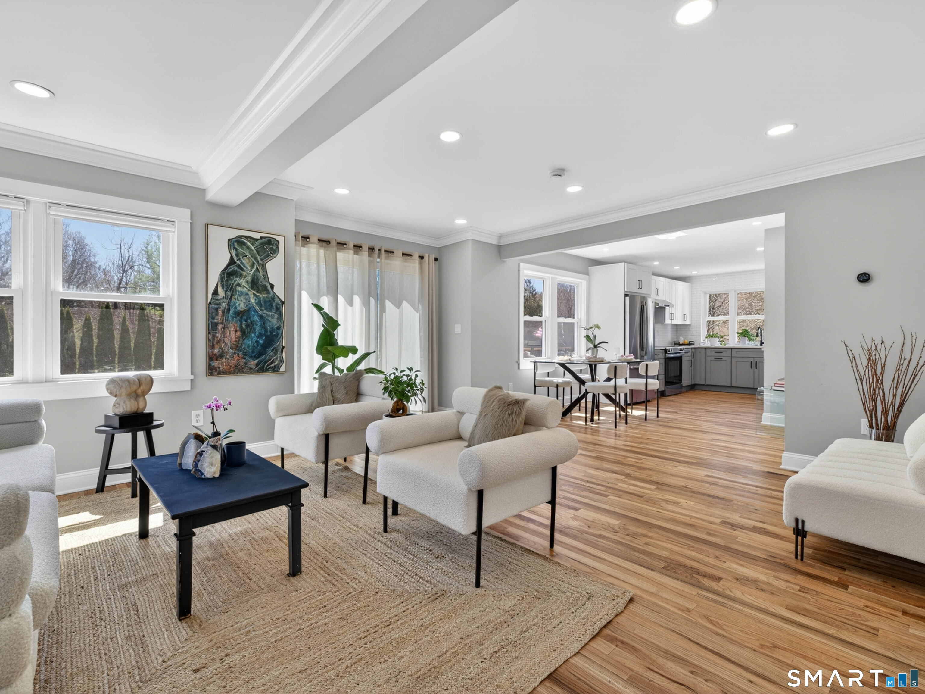 1092 Durham Road Guilford, CT 06437 - Photo 31 of 61 a living room with furniture and a wooden floor