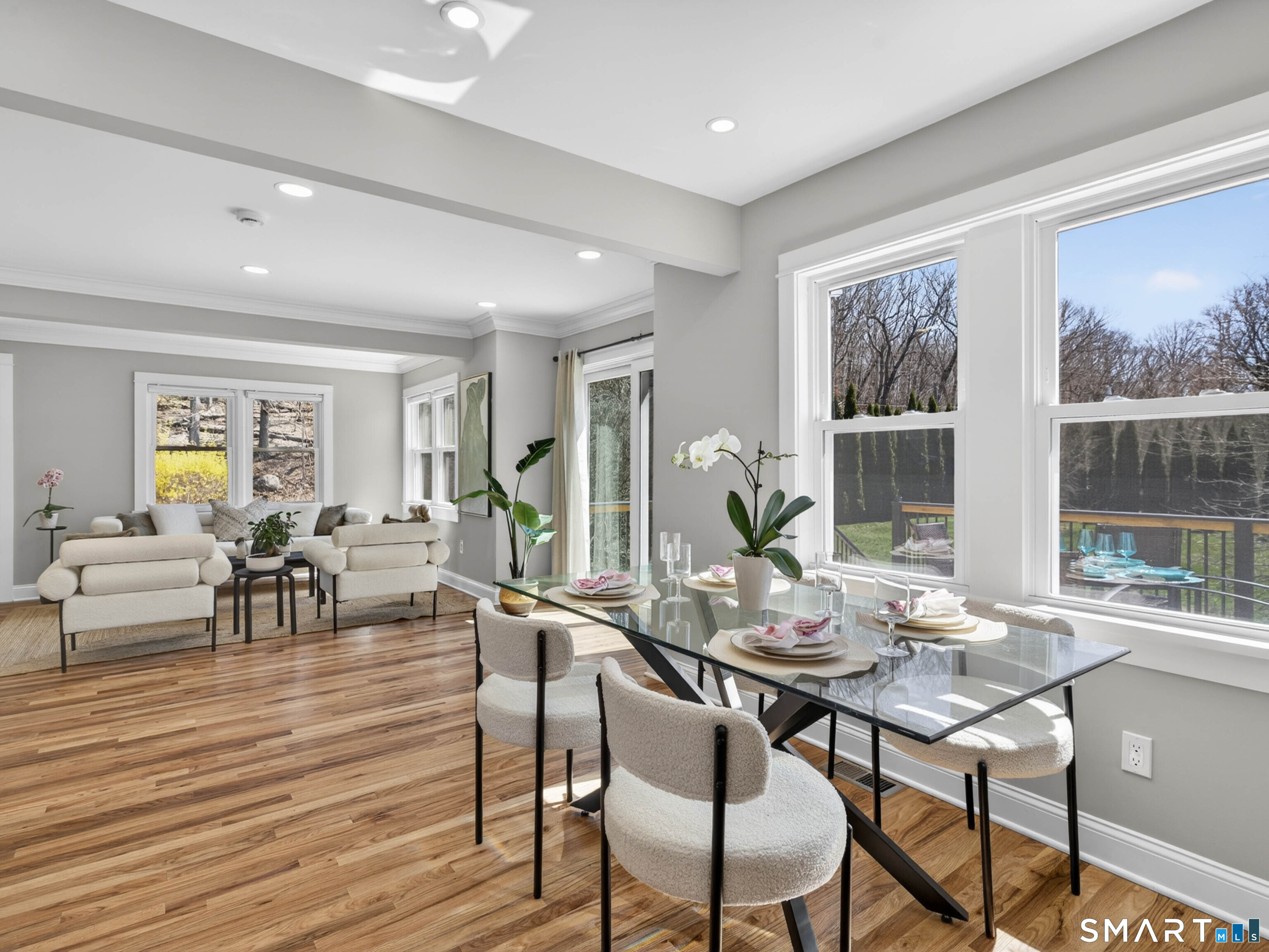 1092 Durham Road Guilford, CT 06437 - Photo 36 of 61 a view of a dining room with furniture large windows and wooden floor
