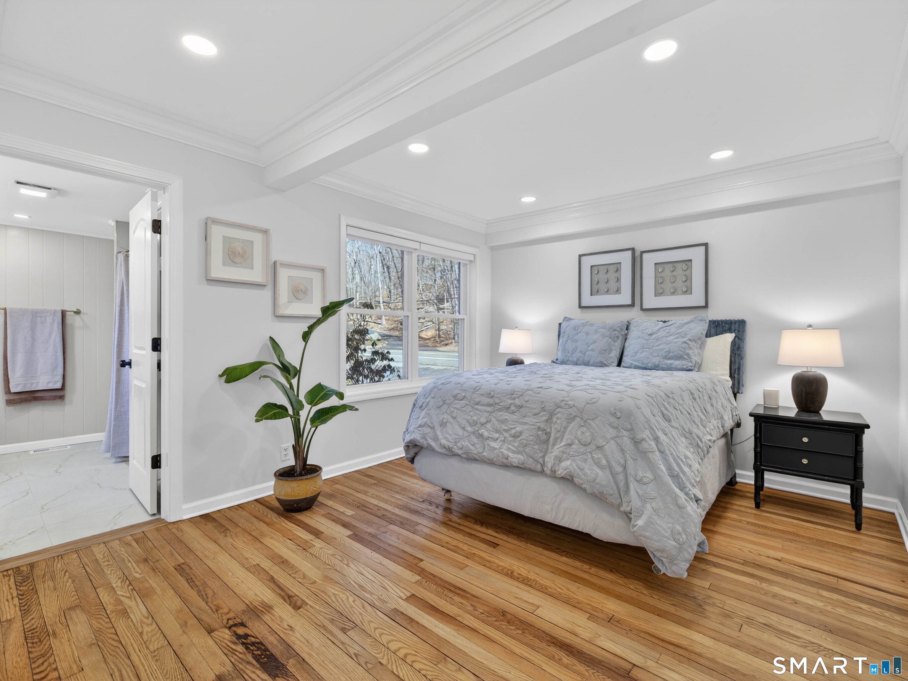 1092 Durham Road Guilford, CT 06437 - Photo 37 of 61 a bedroom with a bed and wooden floor