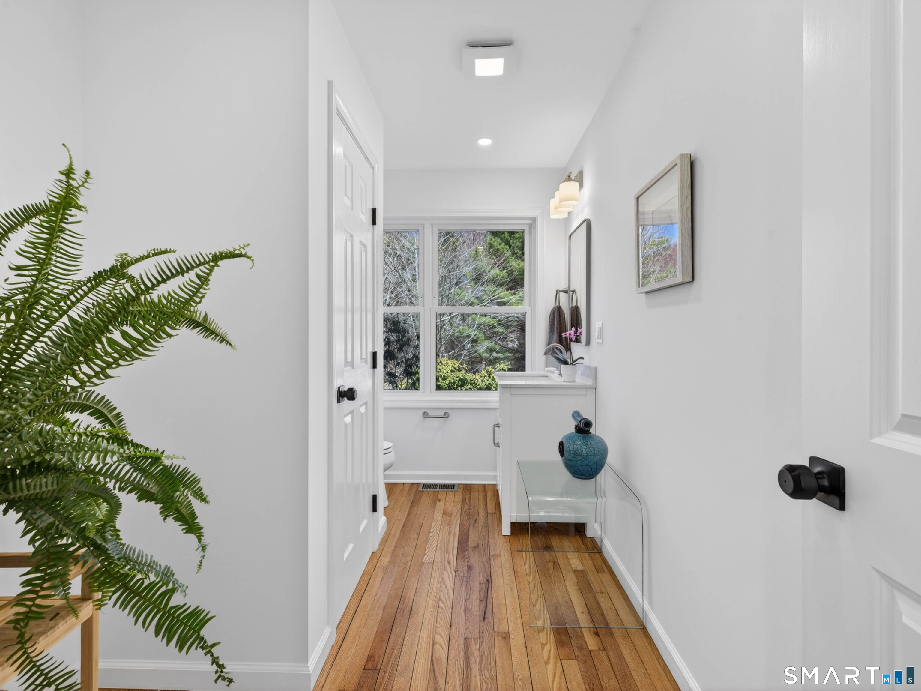 1092 Durham Road Guilford, CT 06437 - Photo 44 of 61 a view of entryway and hall with wooden floor