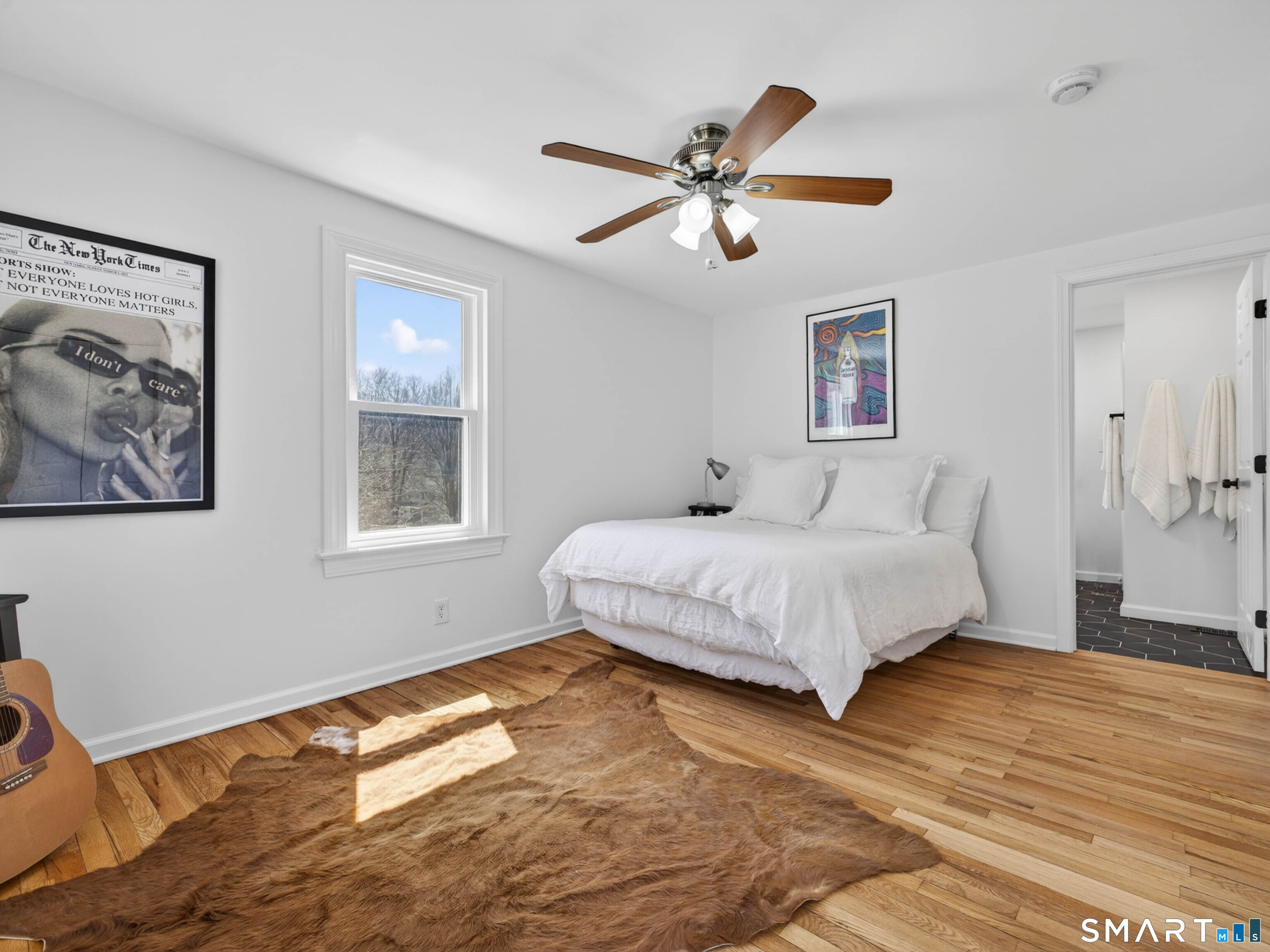 1092 Durham Road Guilford, CT 06437 - Photo 50 of 61 a bedroom with a large bed and a window