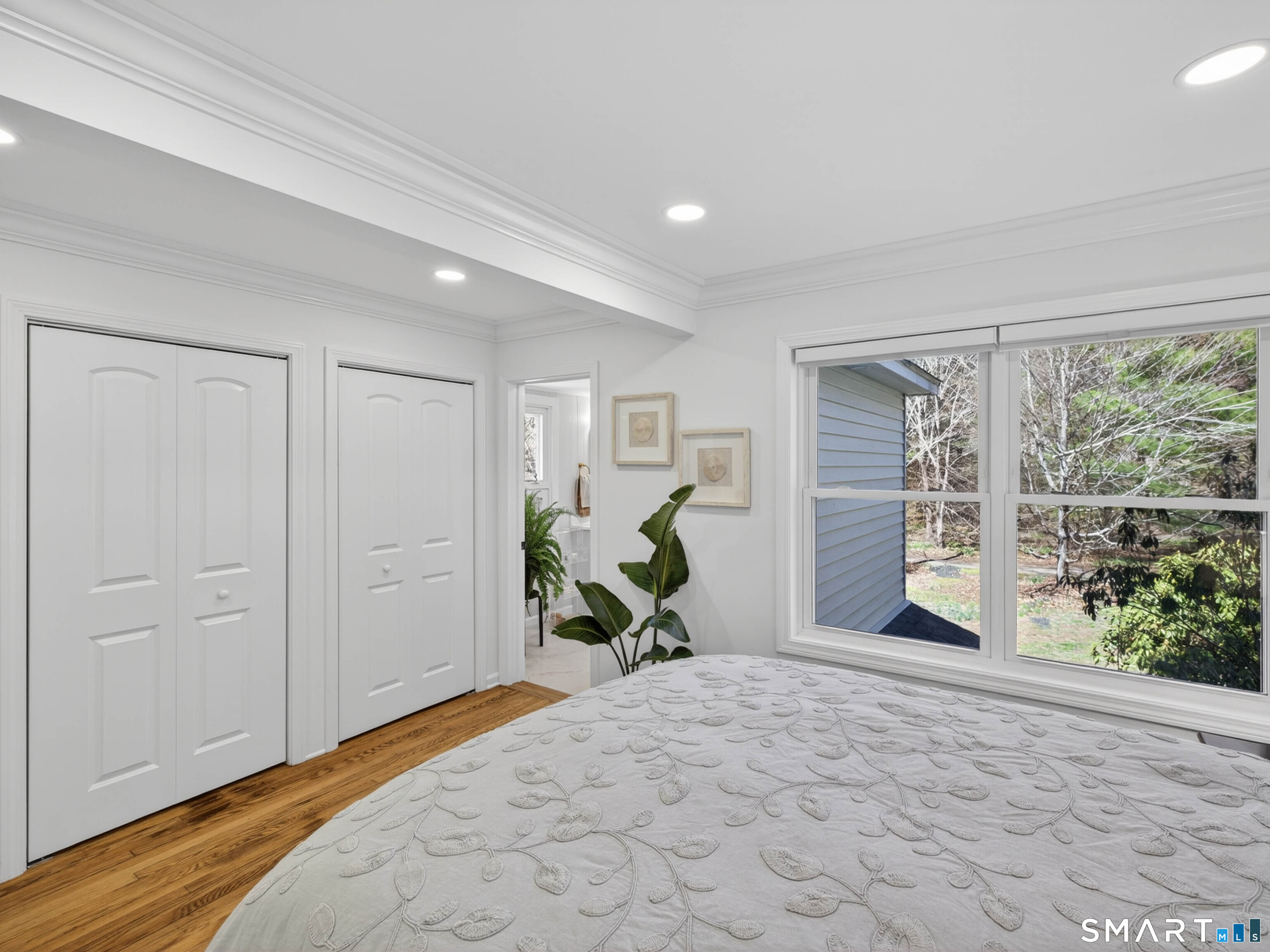 1092 Durham Road Guilford, CT 06437 - Photo 59 of 61 a bedroom with a bed and a large window