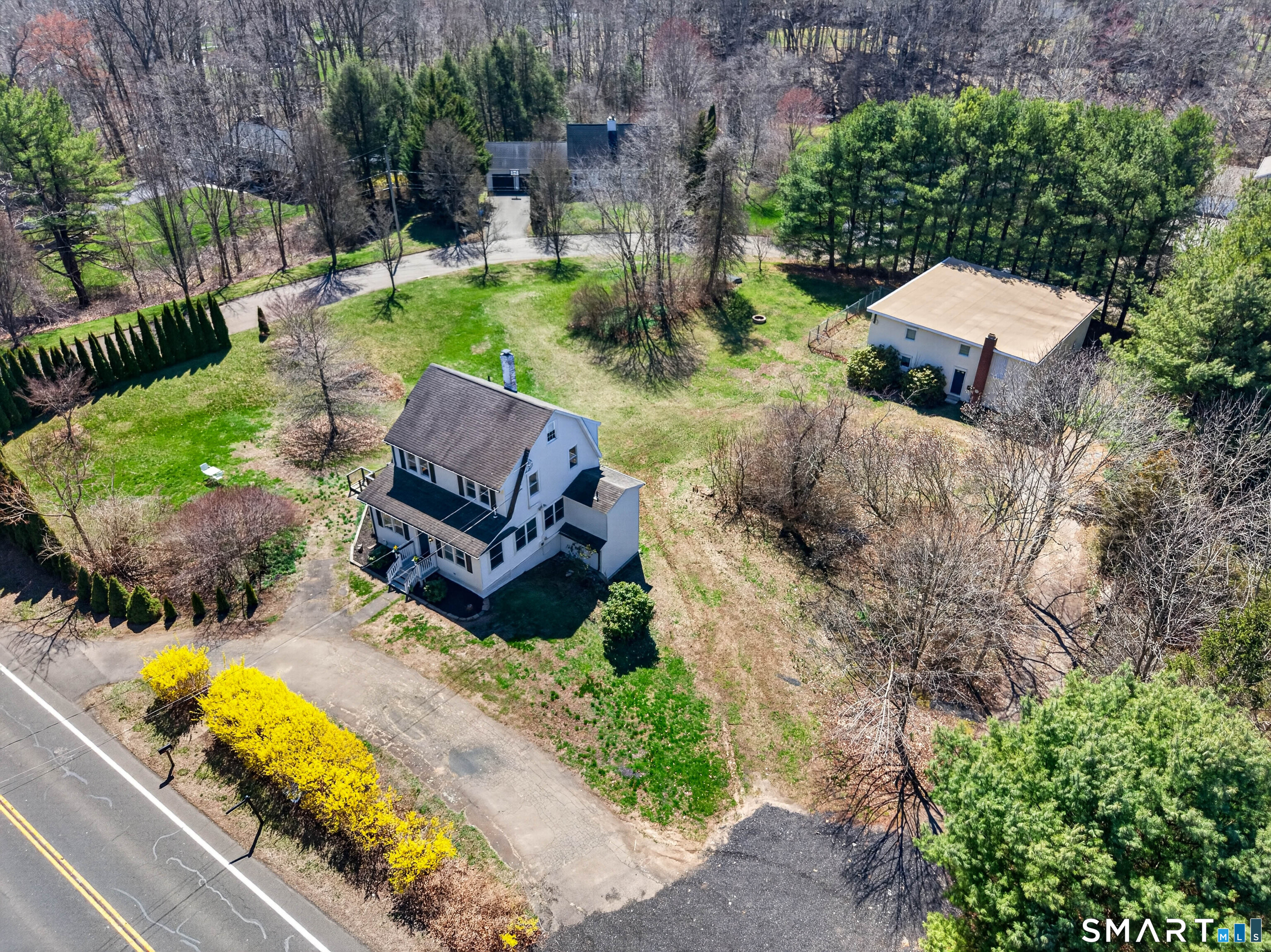 1092 Durham Road Guilford, CT 06437 - Photo 9 of 61 a view of a backyard with plants and outdoor seating