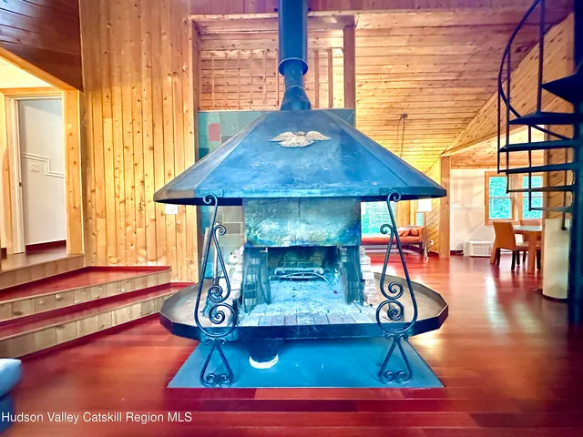 a bedroom with a bed and a walk in closet