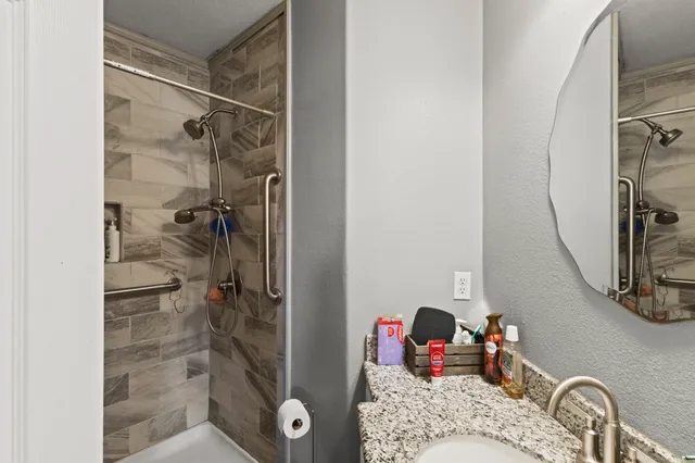 a bathroom with a sink and a mirror