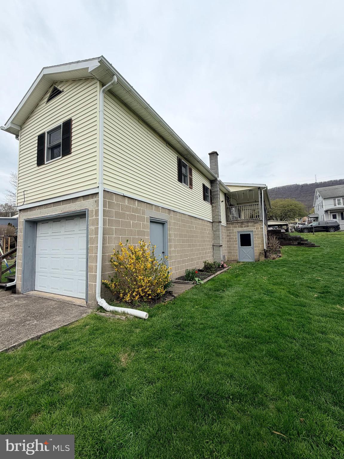 217 Oak Street Wiconisco, PA 17048 - Photo 1 of 31 a front view of a house with a garden and yard