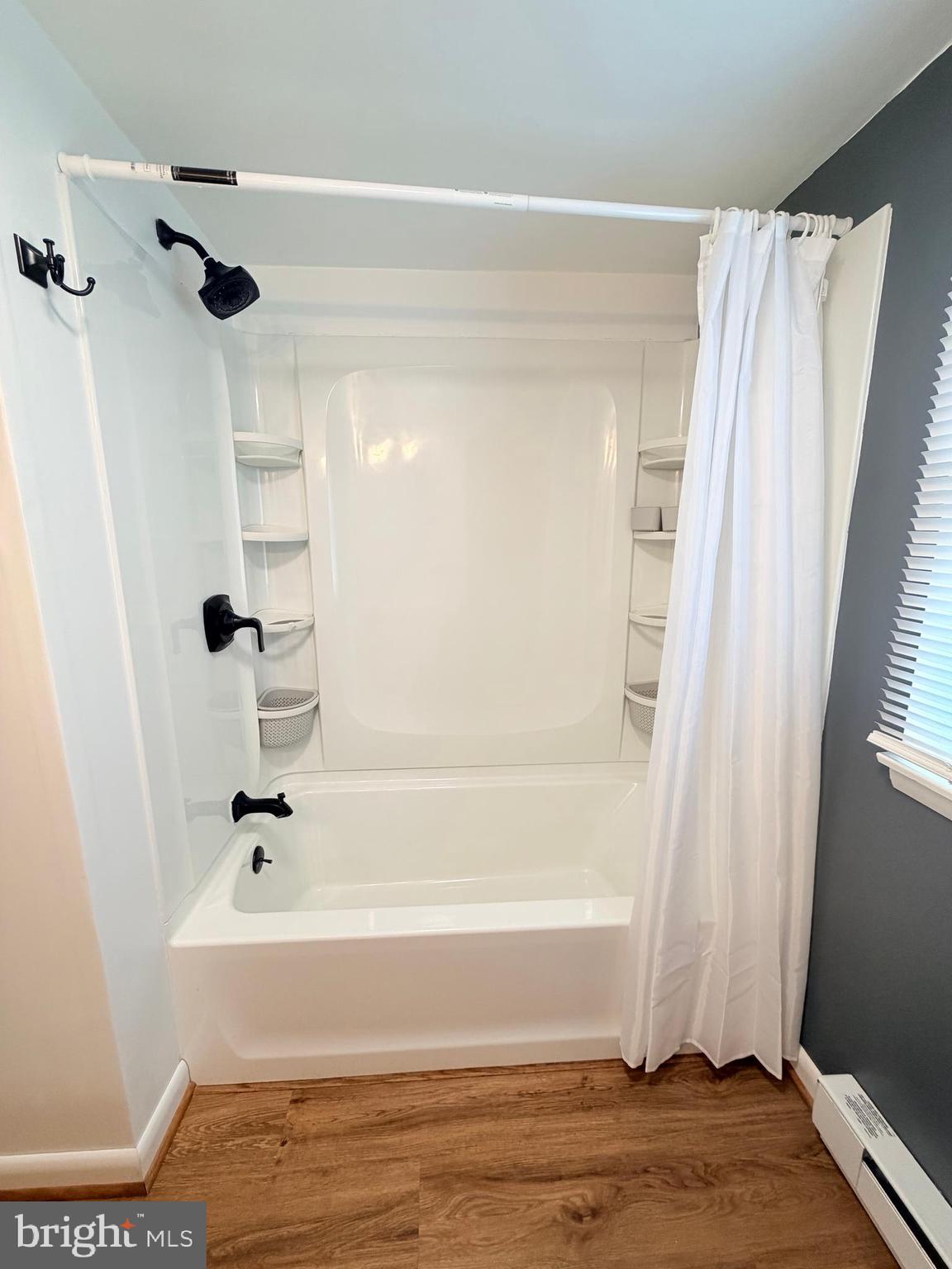 217 Oak Street Wiconisco, PA 17048 - Photo 21 of 31 a bathroom with a bathtub and a shower