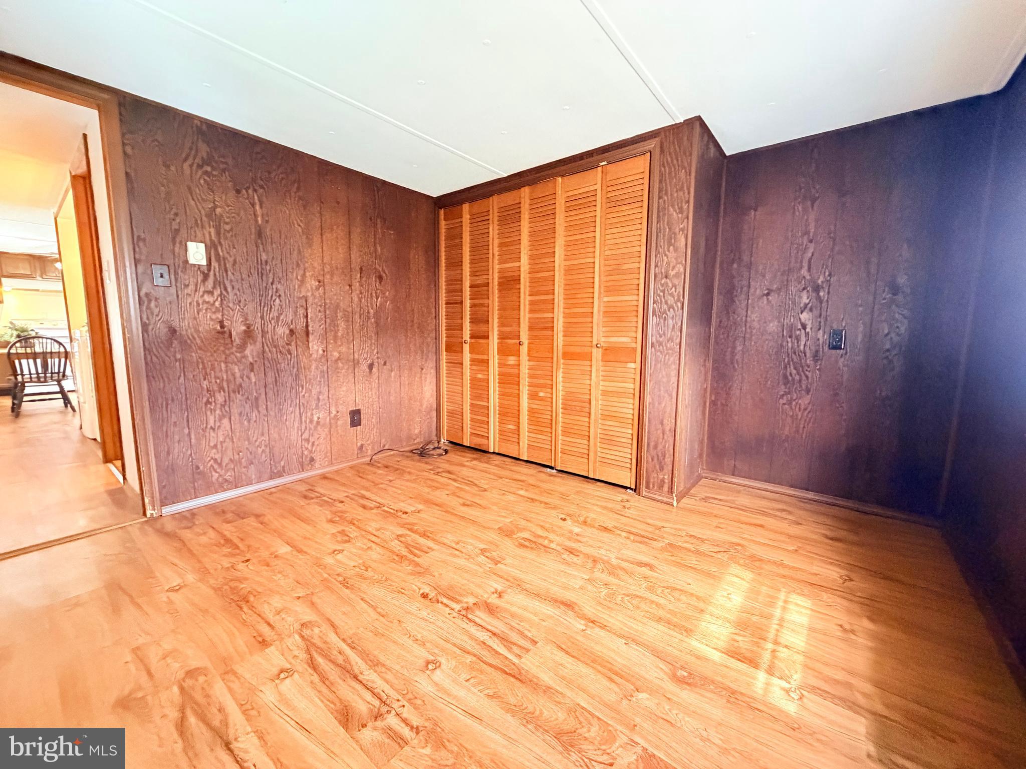 217 Oak Street Wiconisco, PA 17048 - Photo 23 of 31 a view of an empty room with wooden floor and a window