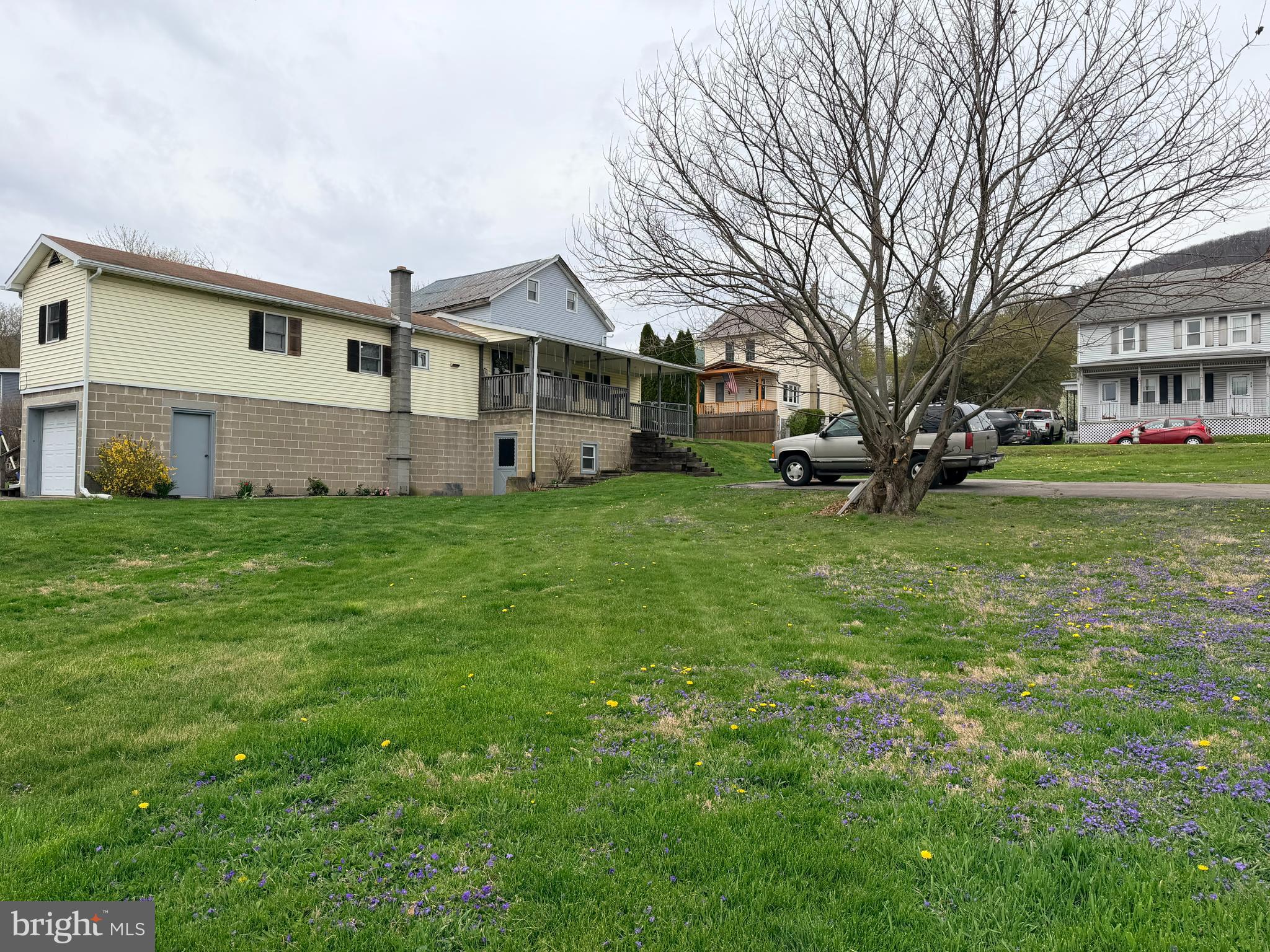 217 Oak Street Wiconisco, PA 17048 - Photo 5 of 31 a view of a big house with a big yard and large trees